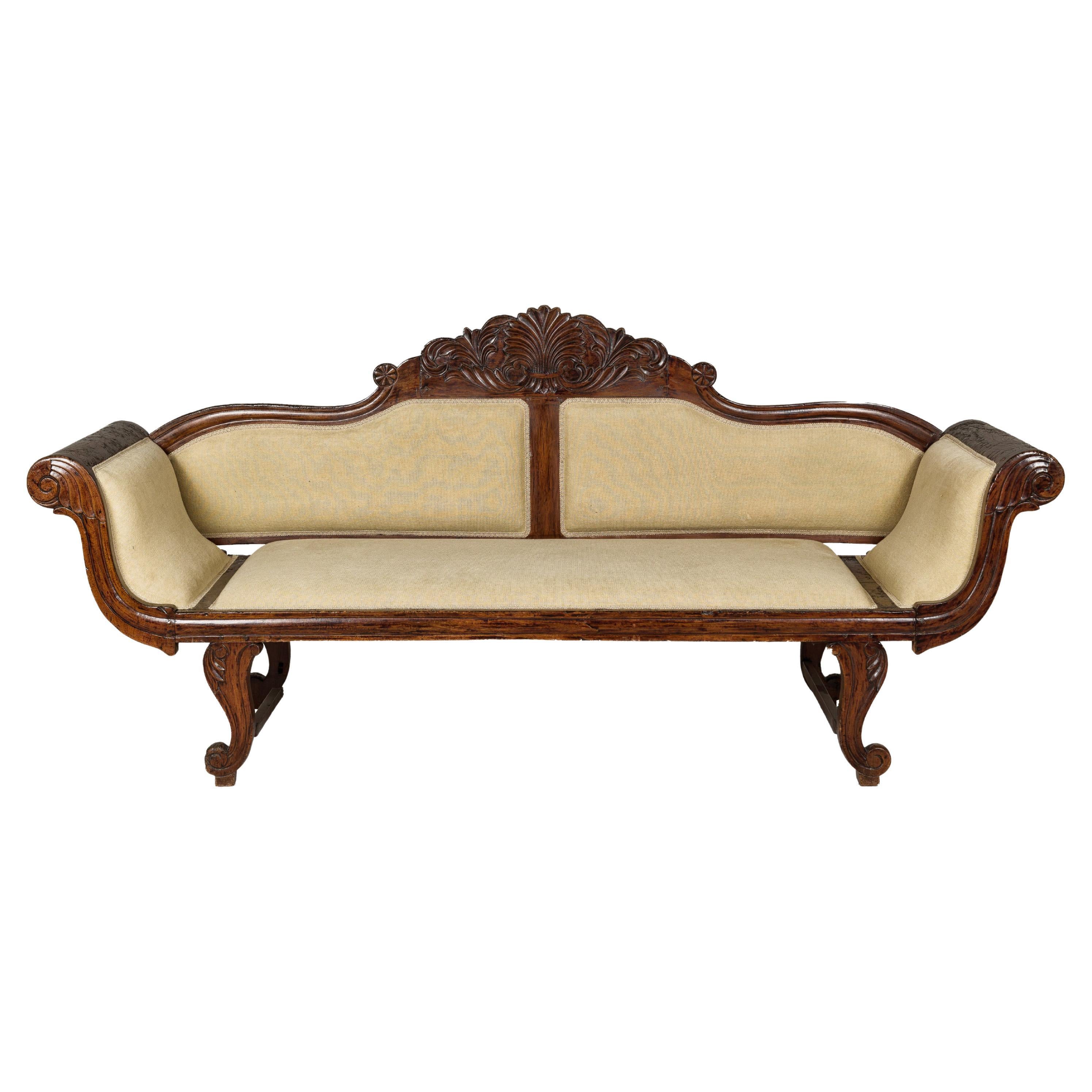 Dutch Colonial Wooden Settee with Carved Crest and Out-Scrolling Arms For Sale