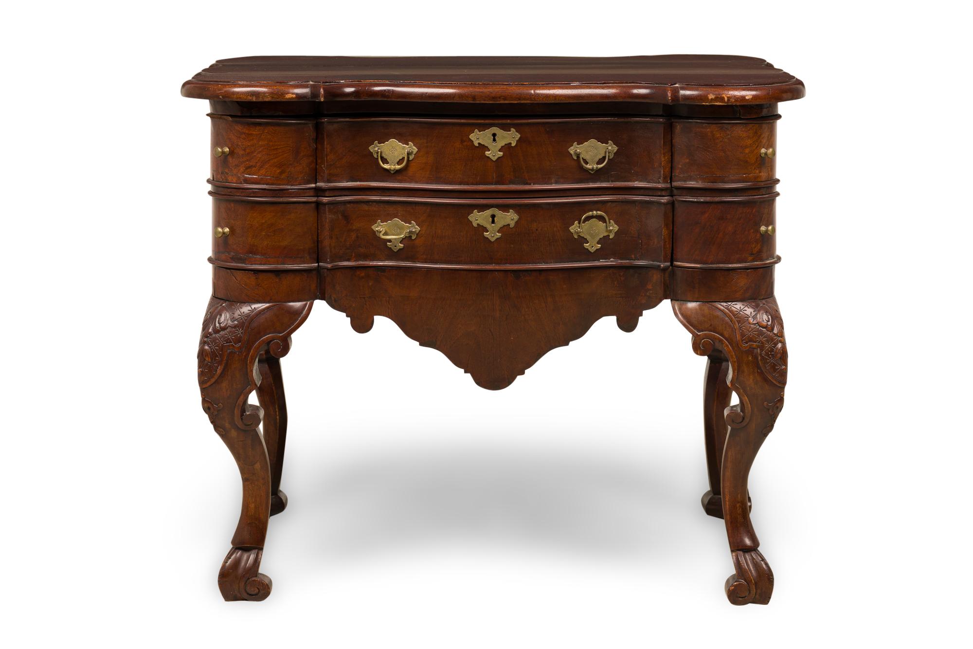 Dutch Continental (18th Century) lowboy / center table with 2 drawers having original etched brass handles centering rounded side drawers above a shaped top and resting on carved cabriole legs (finished back).