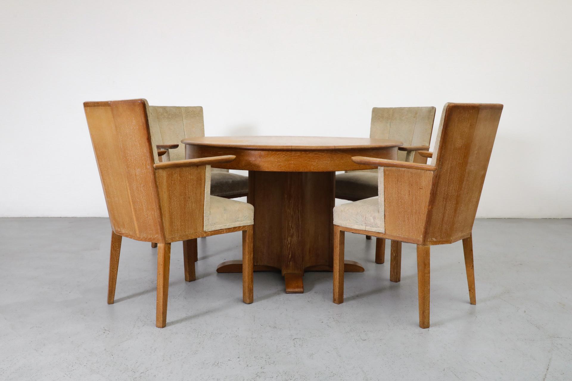 Beautiful round oak Art Deco dining, card or center table with pedestal base by C. De Jong for J.A. Boskamp En Zonen. Beautiful oak grain and pedestal base with Art Deco detail. Lovely patina with wear that is consistent with it's age and use. Shot