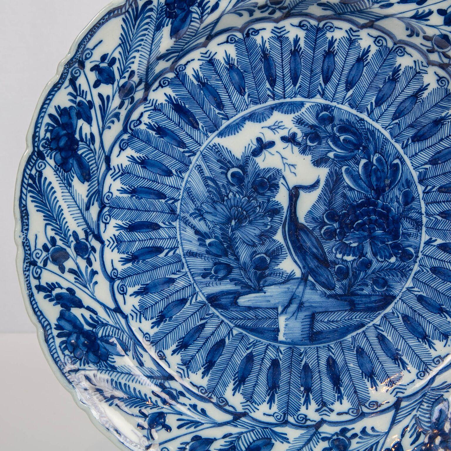 18th Century Dutch Delft Blue and White Charger with Crane and Butterflies Made, circa 1770