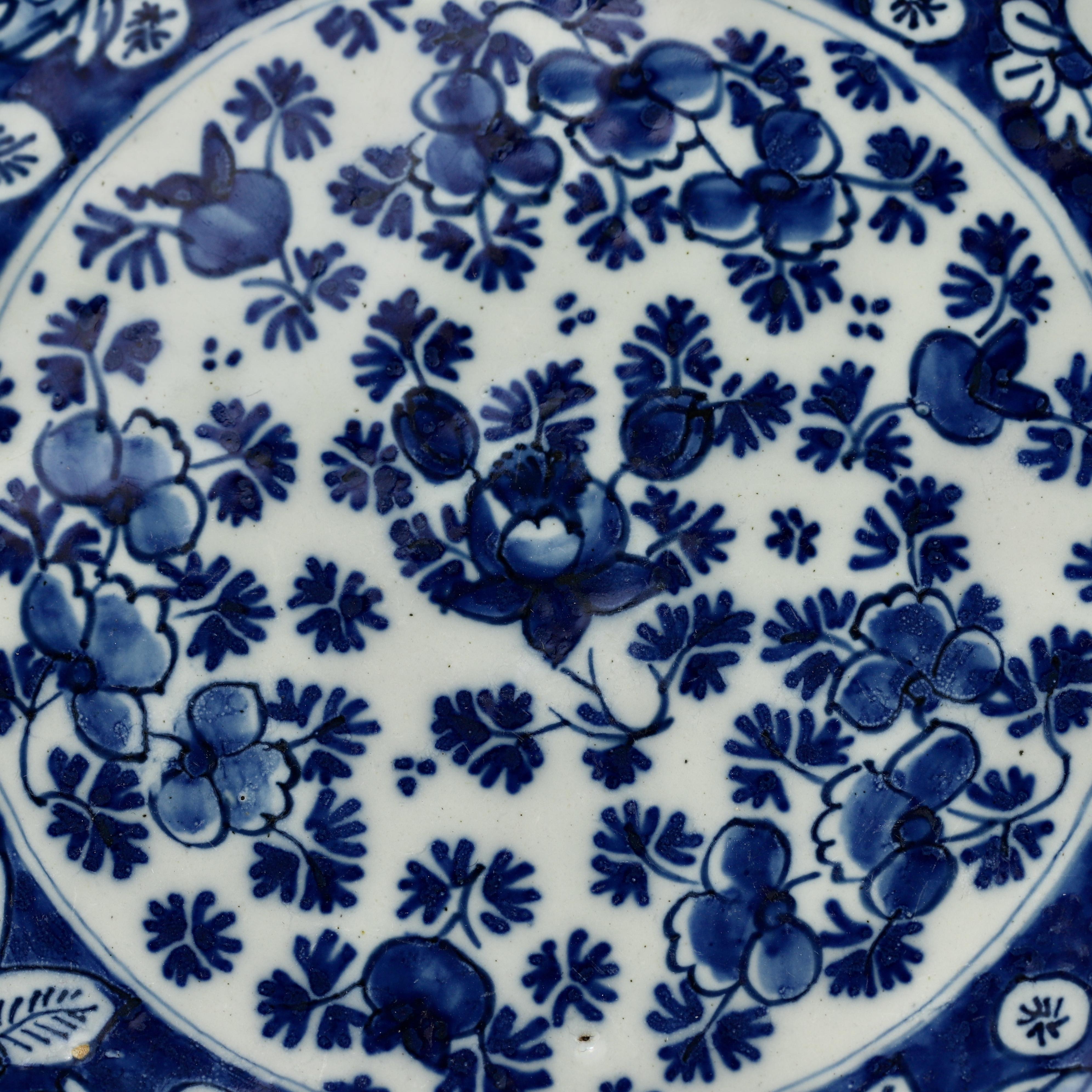City: Delft
Workshop: De Metaale Pot
Owner: Lambertus van Eenhoorn
Date: 1691 - 1724

A fine and rare blue and white plate with floral design
Rose in the center surrounded by five cartouches also with flowers
Marked: LVE 4 0 HC or HVL or HG