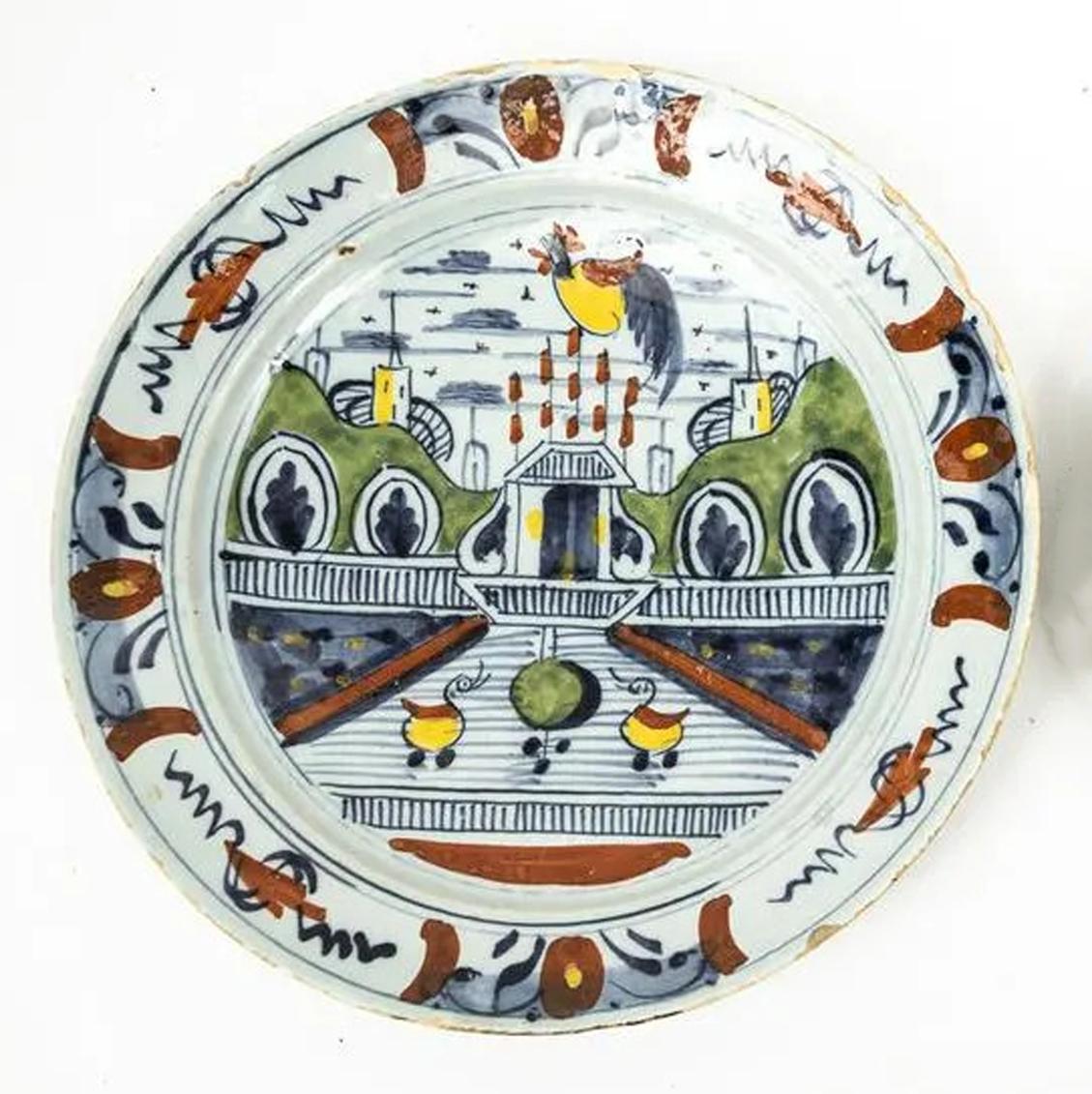 Dutch Delft Polychrome Plate with Garden Scene In Good Condition In Downingtown, PA
