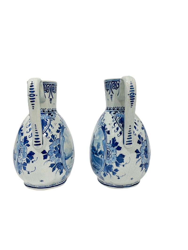 Dutch Delft Porceleyne Fles oval lobed jugs with handles, 1894

2 oval lobed jugs with handles.
In leaf motif painted medallion a scene of seascape and a landscape with ships and windmills. 
Similar jugs with the 2 different scenes on each side.