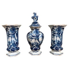 Dutch Delft Three Piece Garniture with Dog and Parrot, Vases Set, 18th Century
