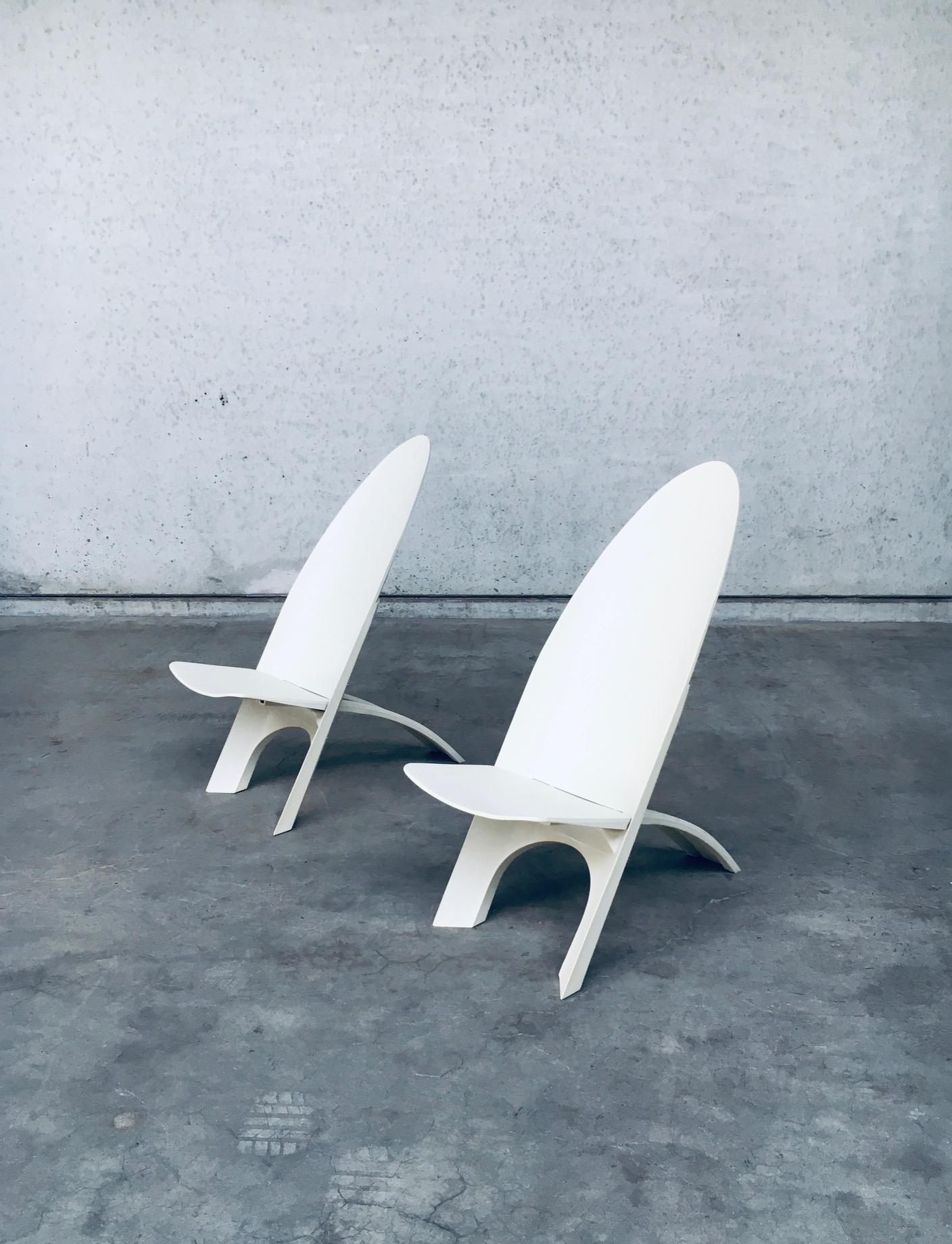 Rare Dutch Design Lounge chair set designed by Dr. B. Schwarz for Demury design. Marked; Dutch Design B.P.H. It is a shell chair of molded cream white plastic Material with two integrated parts. Both chairs are in very good condition with slight