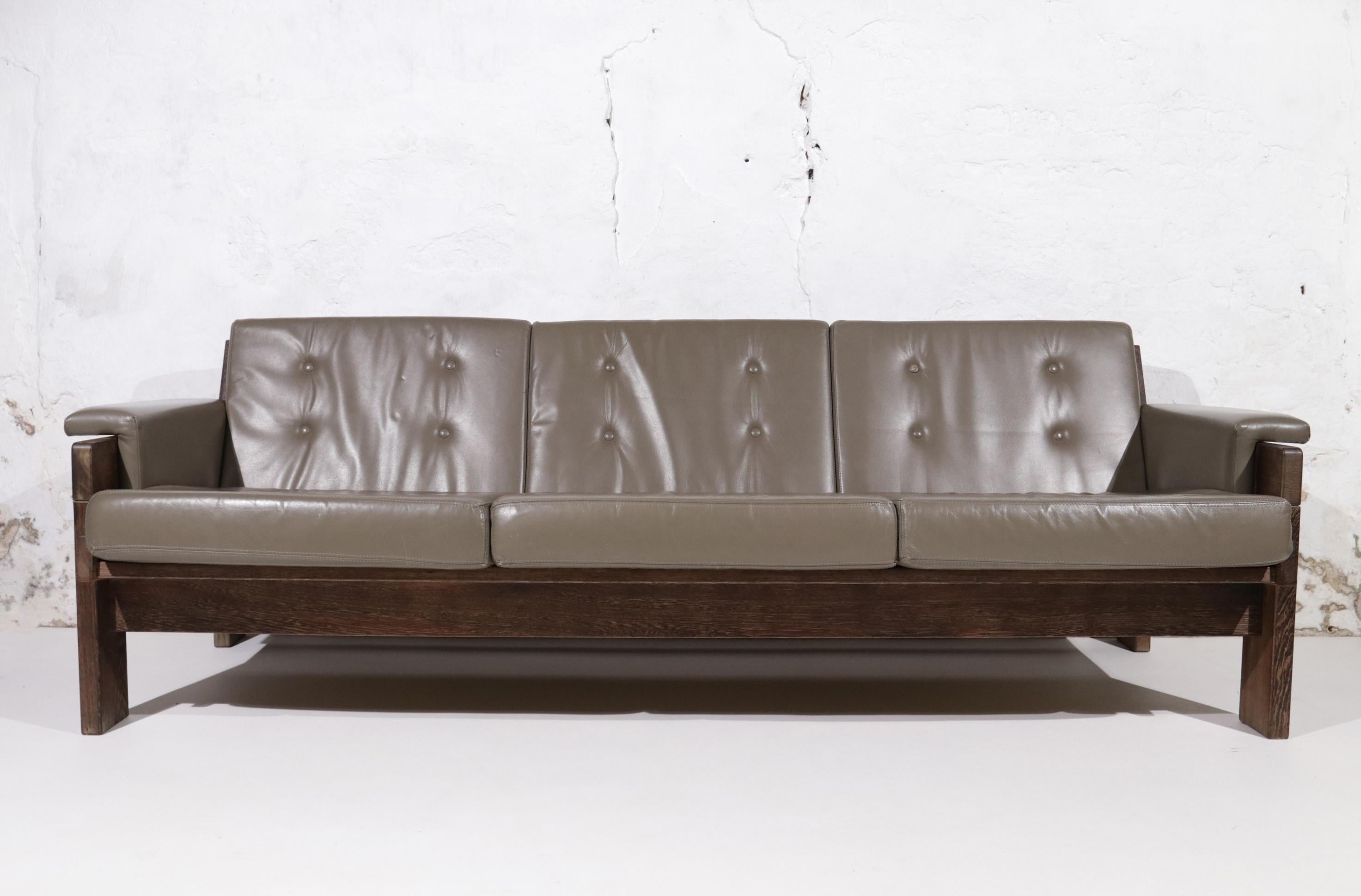 Very nice sofa designed by the Dutch designer Martin Visser in the 1970s.
The frame is made of solid Wenge wood and the cushions are made of leather.