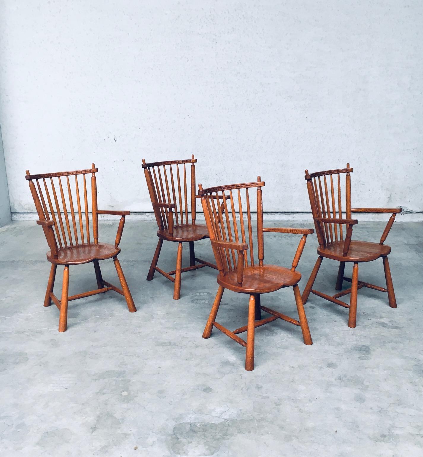 Vintage Midcentury Dutch Design Oak Arm Chair set of 4 by De Ster Gelderland. Made in the Netherlands, 1960's. Solid oak turned and carved chairs. Beautiful and shape and details. All chairs are in very good, original condition. Each chair measures