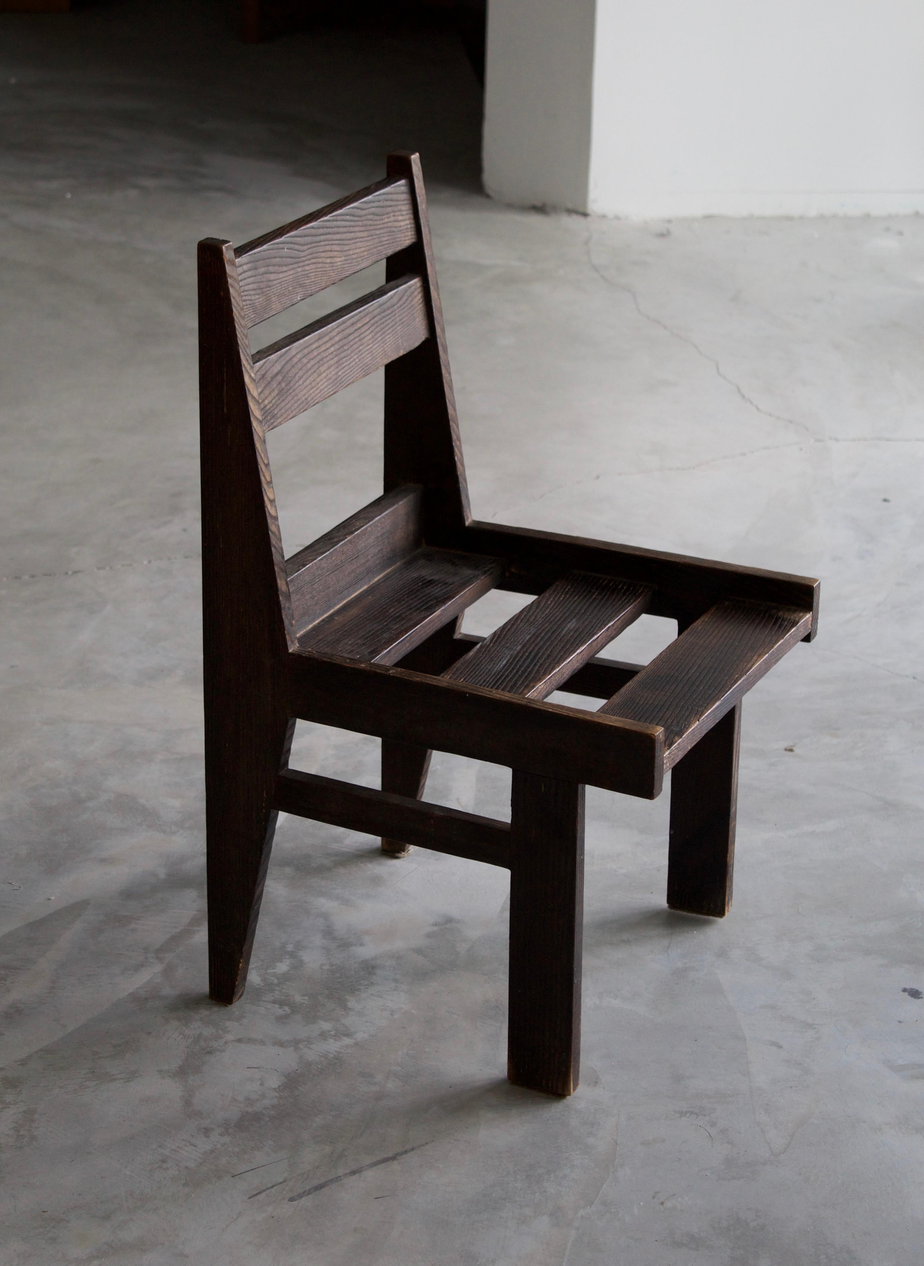 A side chair. In finely carved and joined solid oak. Designed and produced in the Netherlands, c. 1940s-1950s.

Other designers of the period include Jean Prouvé, Pierre Jeanneret, Pierre Chapo, and Gerrit Rietveld.