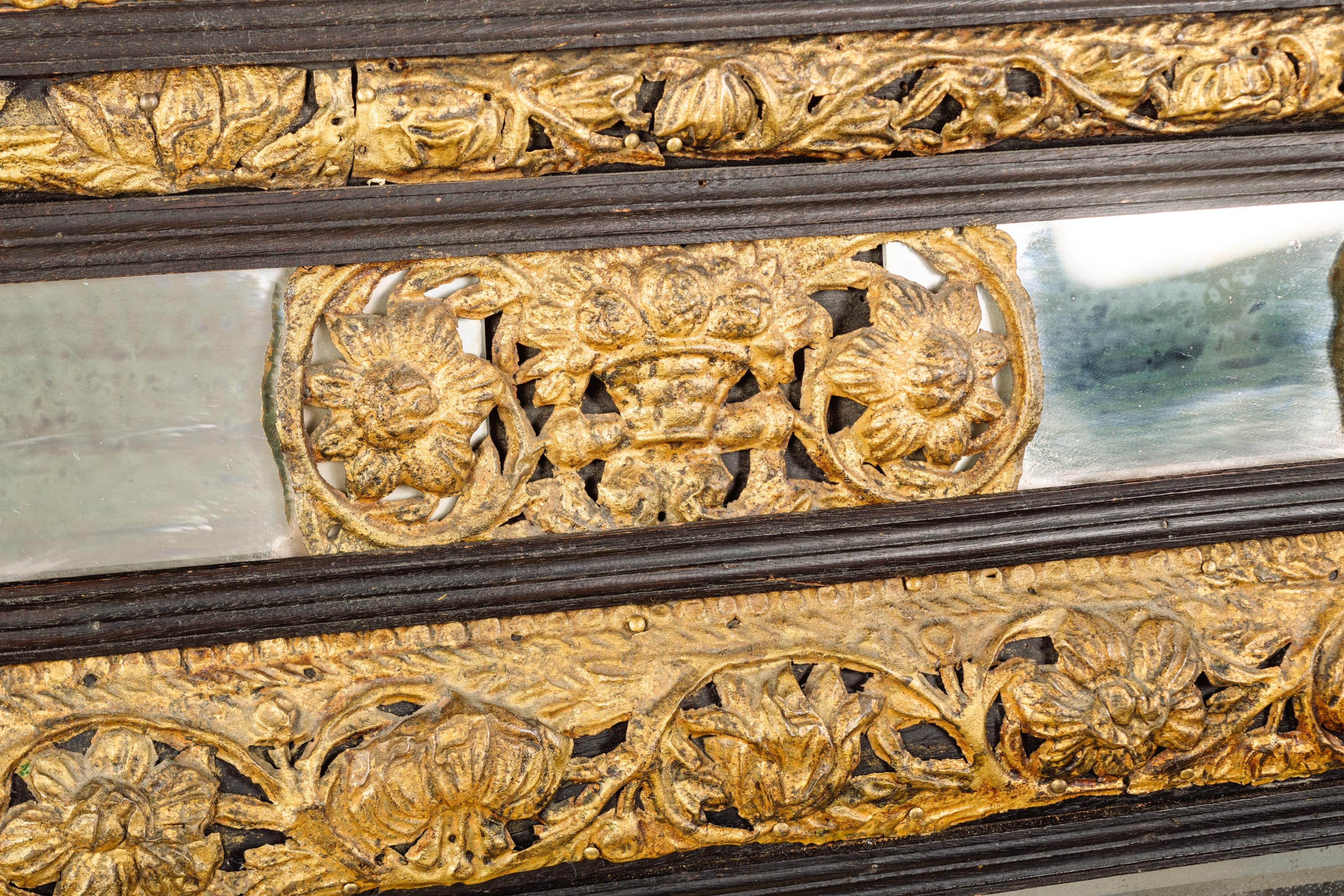 Dutch Ebonized and Repousse Gilt-Metal Cushion Mirror In Good Condition For Sale In Brighton, West Sussex