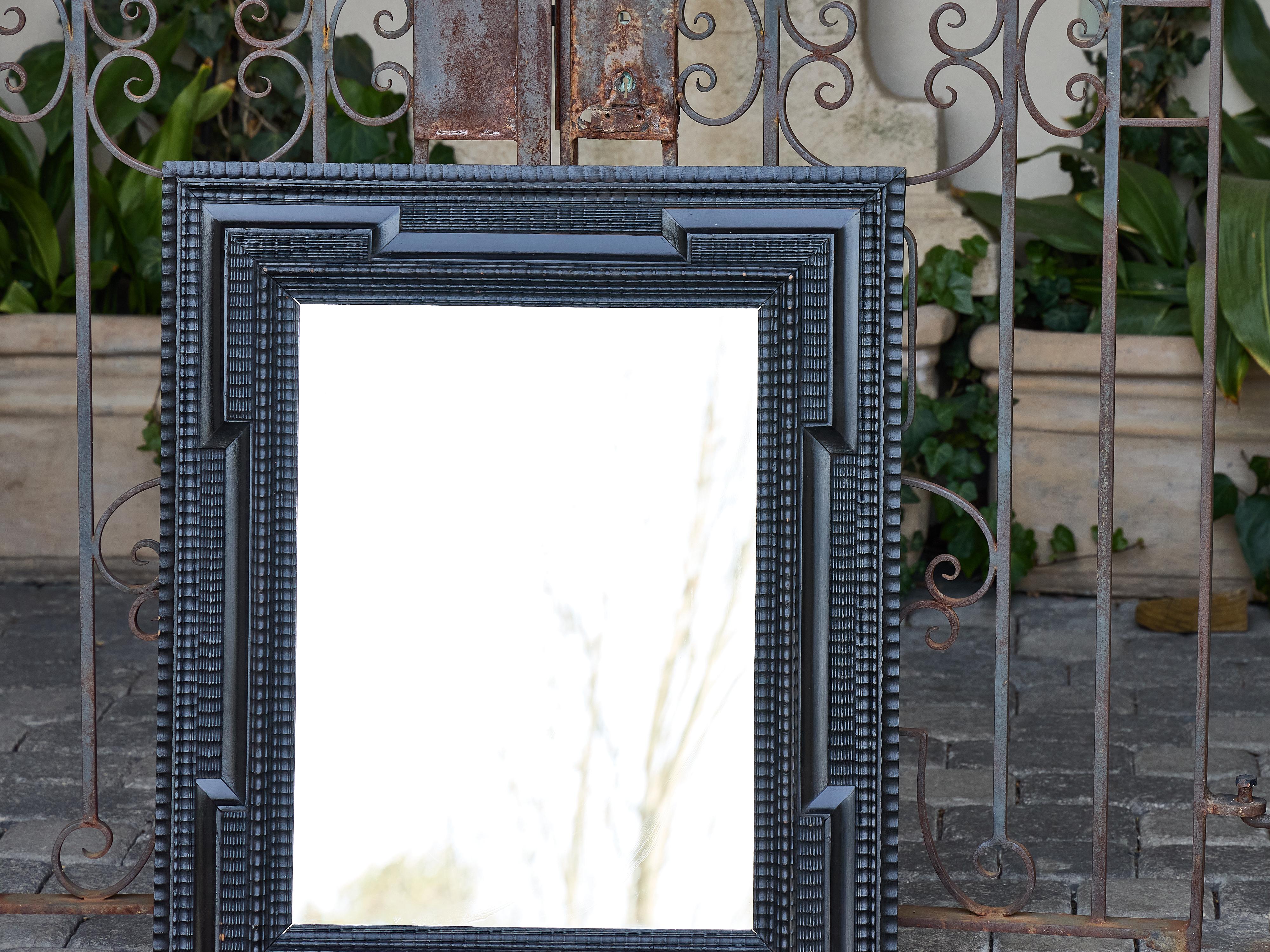 Dutch Ebonized Wood Mirror with Carved Geometric Frame, circa 1900 For Sale 9