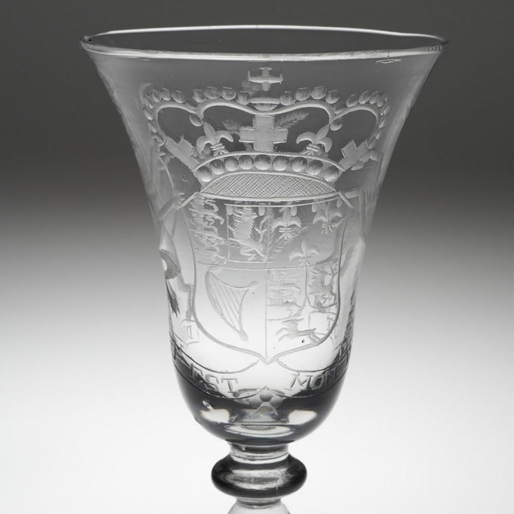 Dutch Engraved Royal Armorial Princess Anne Princess of Orange Newcastle Light Baluster, c1750

The literal translation of the motto is God is my right, a reference to the monarchy's divine right to rule. This is a controversial version of the motto