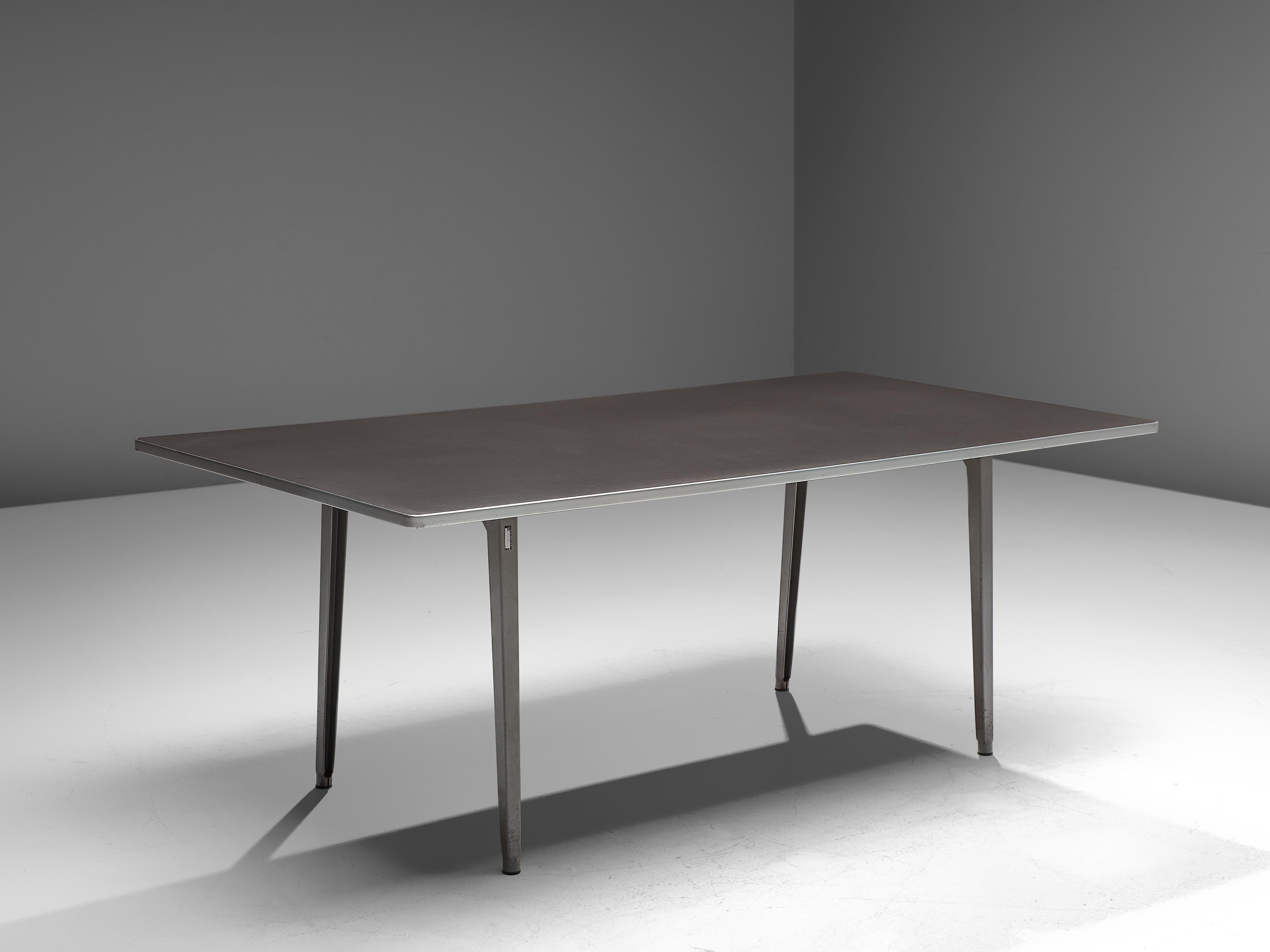 Friso Kramer for TH delft, dining table, metal, The Netherlands, 1940s. 

This work table is designed by Friso Kramer in the 1940s. The table features a modest design, with slightly tapered legs that are tilted. This table is an example of the