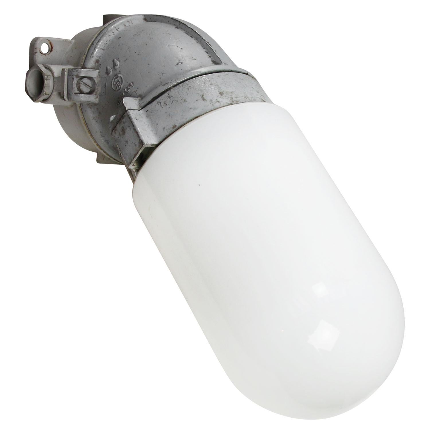 Dutch industrial wall lamp made by ‘Industria Rotterdam’
Aluminum with white opaline glass

Weight: 0.80 kg / 1.8 lb

Priced per individual item. All lamps have been made suitable by international standards for incandescent light bulbs,