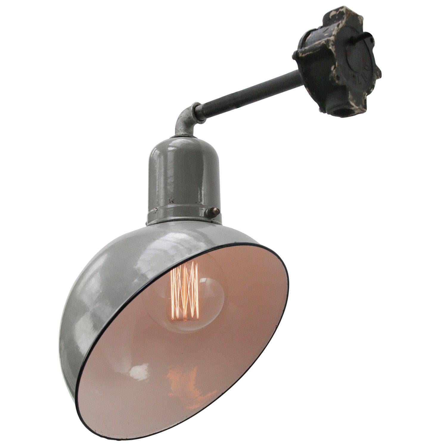 Rare vintage Dutch industrial wall light
grey enamel, cast iron wall base

Weight: 1.80 kg / 4 lb

Priced per individual item. All lamps have been made suitable by international standards for incandescent light bulbs, energy-efficient and LED