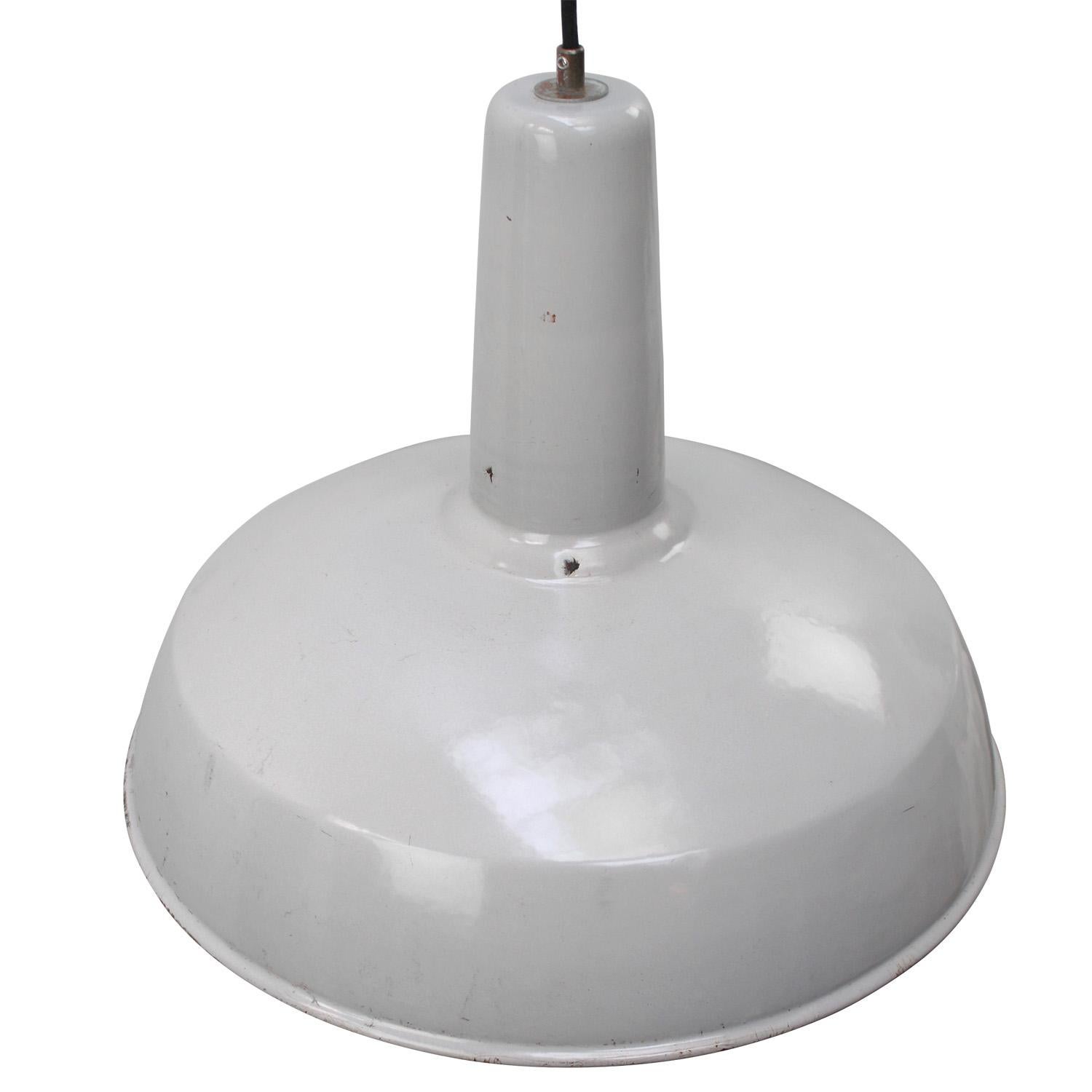 Industrial hanging lamp made by Philips, Holland
gray enamel white interior

Weight: 1.90 kg / 4.2 lb

Priced per individual item. All lamps have been made suitable by international standards for incandescent light bulbs, energy-efficient and LED