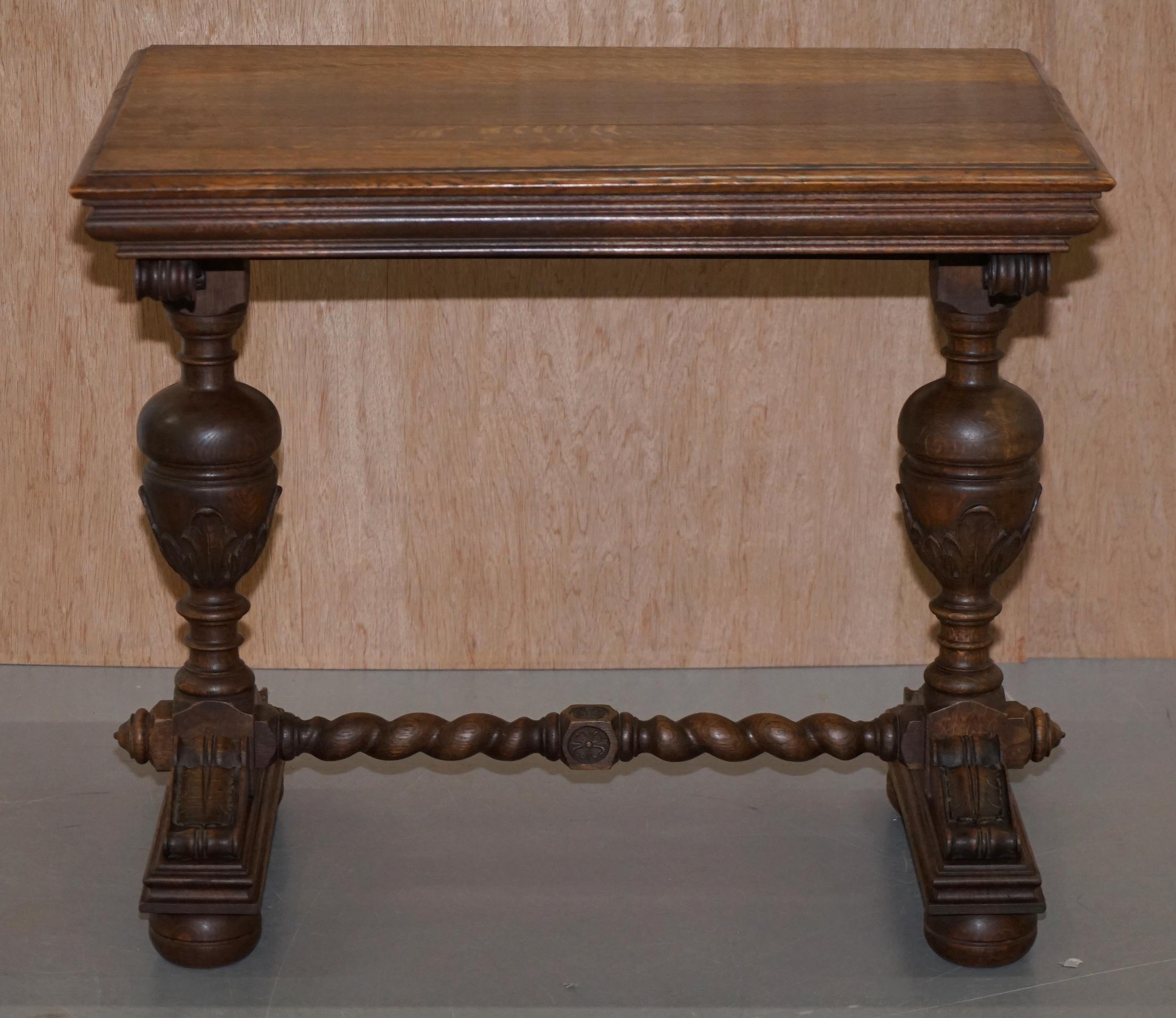 We are delighted to offer for sale this stunning hand carved solid oak Dutch side table with ornately carved base 

This set was hand made by a master craftsman in Bruges Belgium for a very successful Architect. Its part of a complete Library