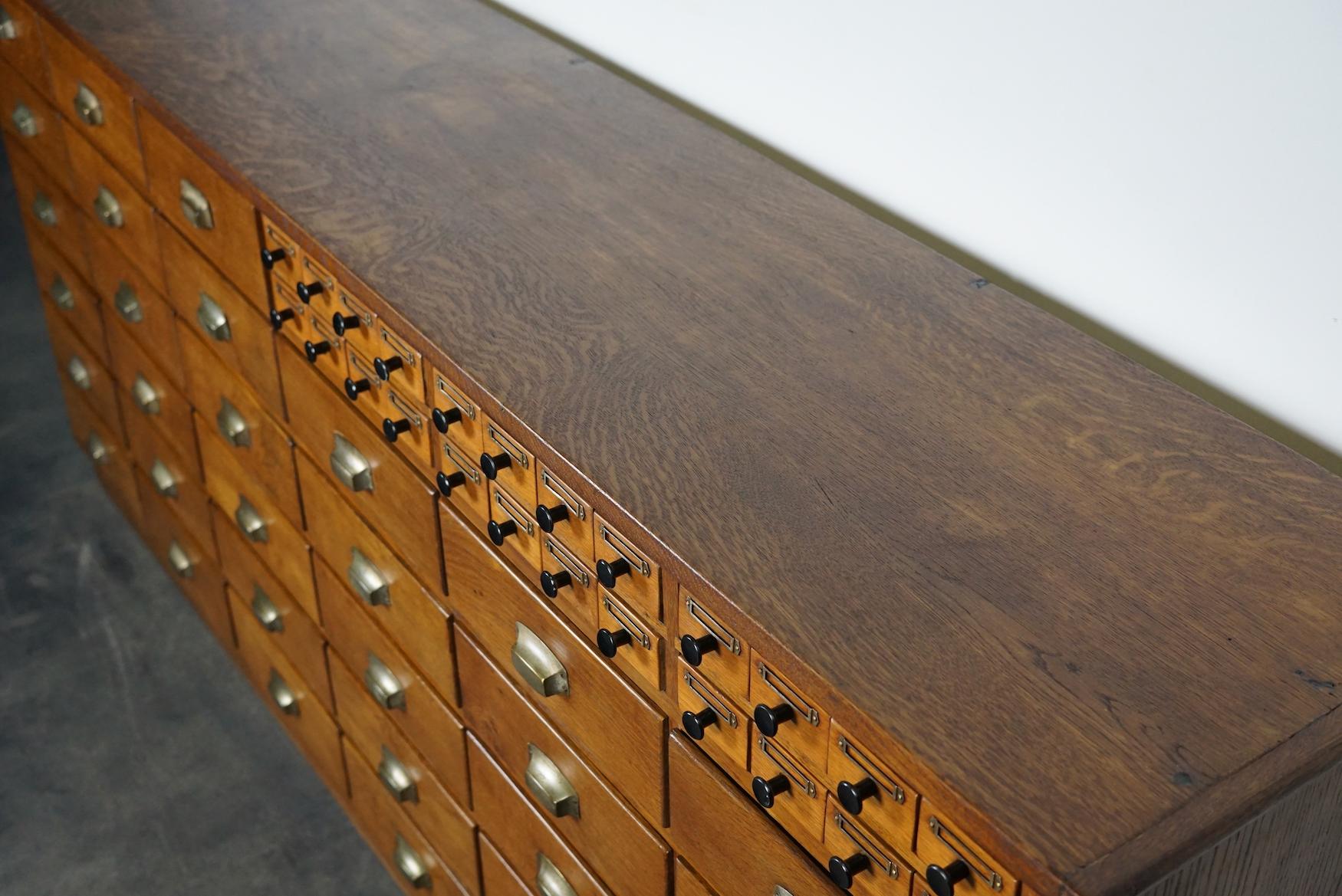 Dutch Industrial Oak Apothecary Cabinet / Bank of Drawers, 1940s 9