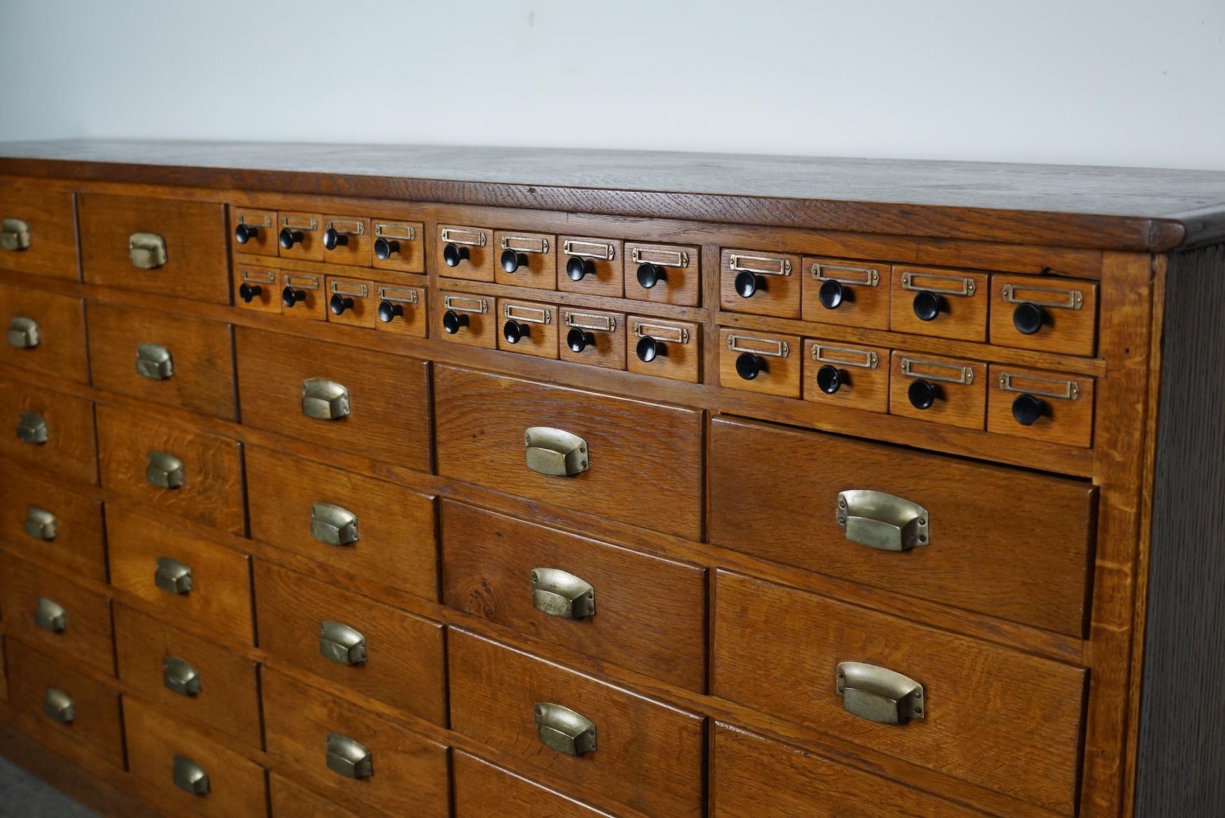 Dutch Industrial Oak Apothecary Cabinet / Bank of Drawers, 1940s 11
