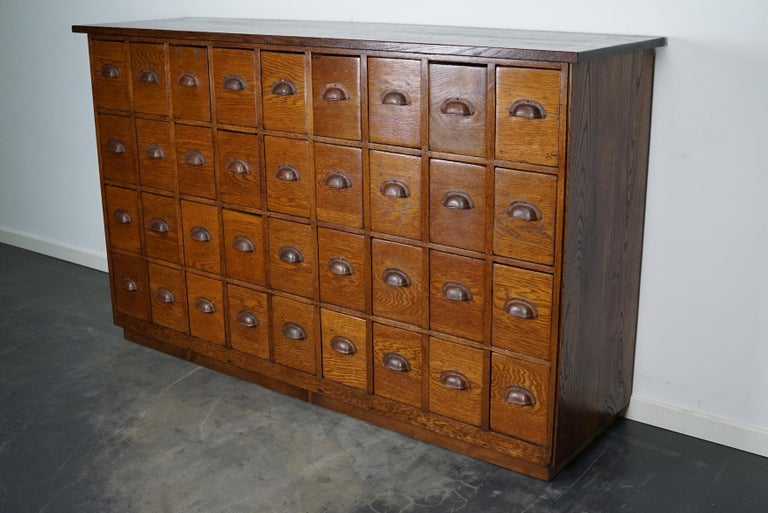 Dutch Industrial Oak Apothecary Cabinet / Bank of Drawers, 1940s For Sale 12