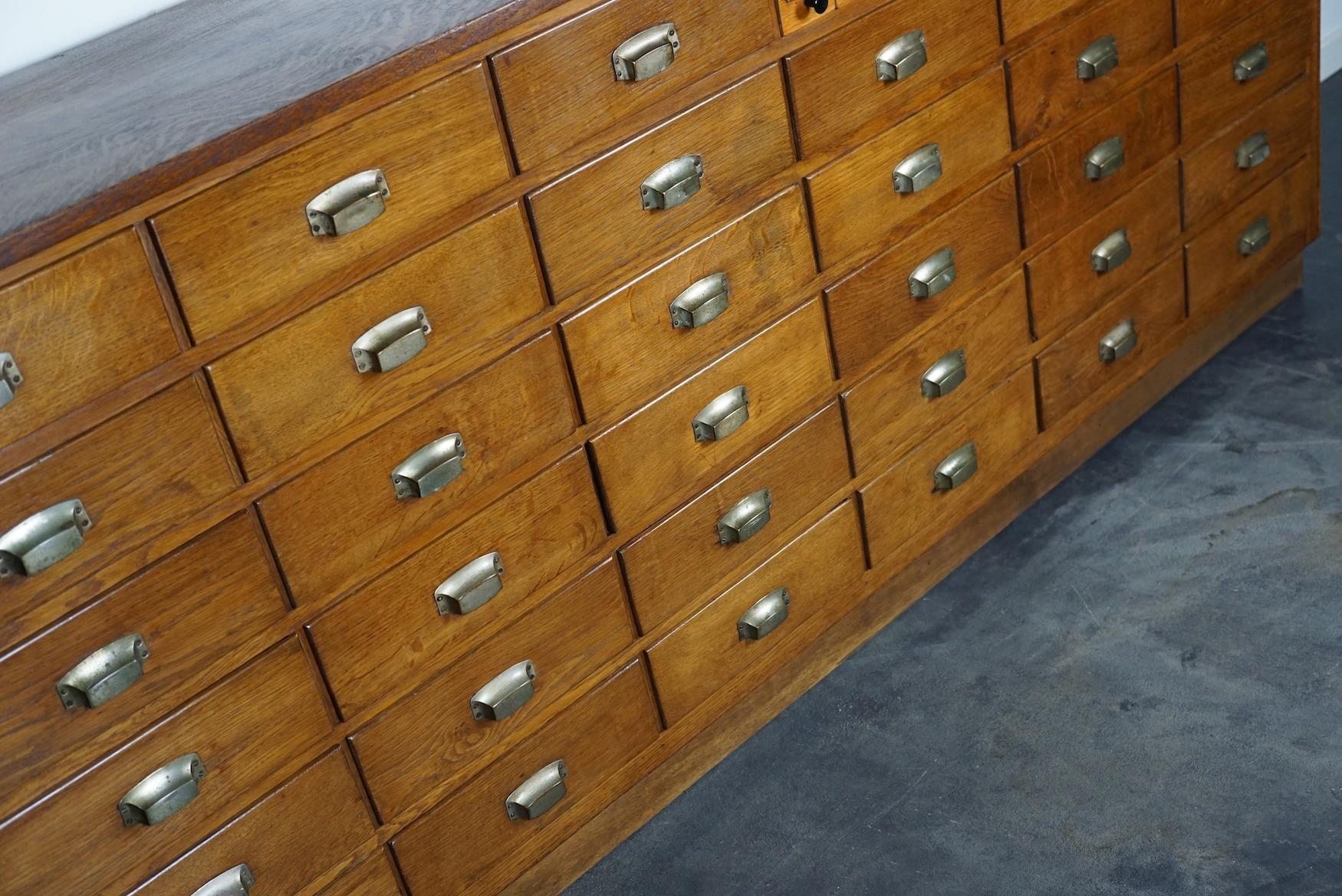 Mid-20th Century Dutch Industrial Oak Apothecary Cabinet / Bank of Drawers, 1940s