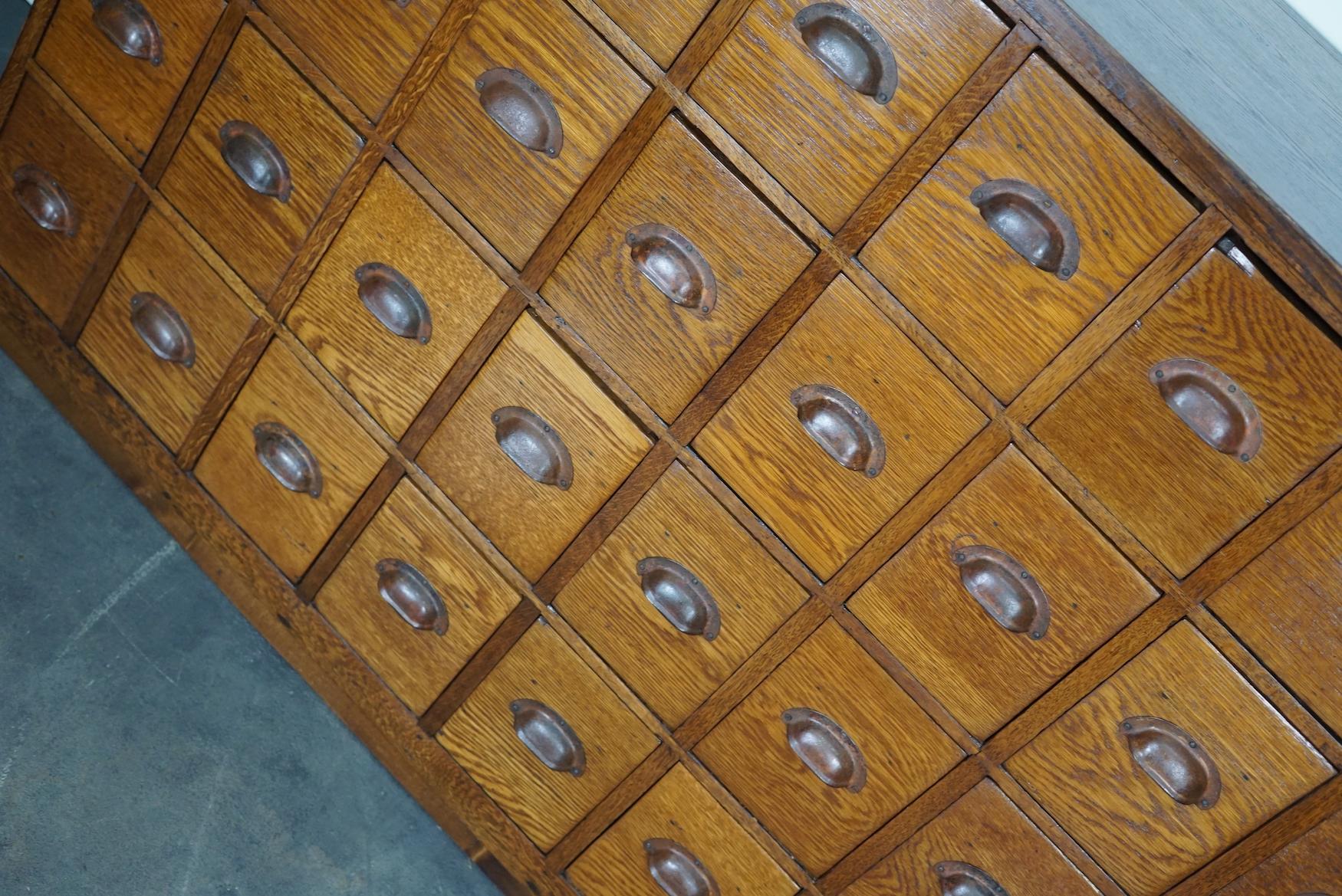 Mid-20th Century Dutch Industrial Oak Apothecary Cabinet / Bank of Drawers, 1940s