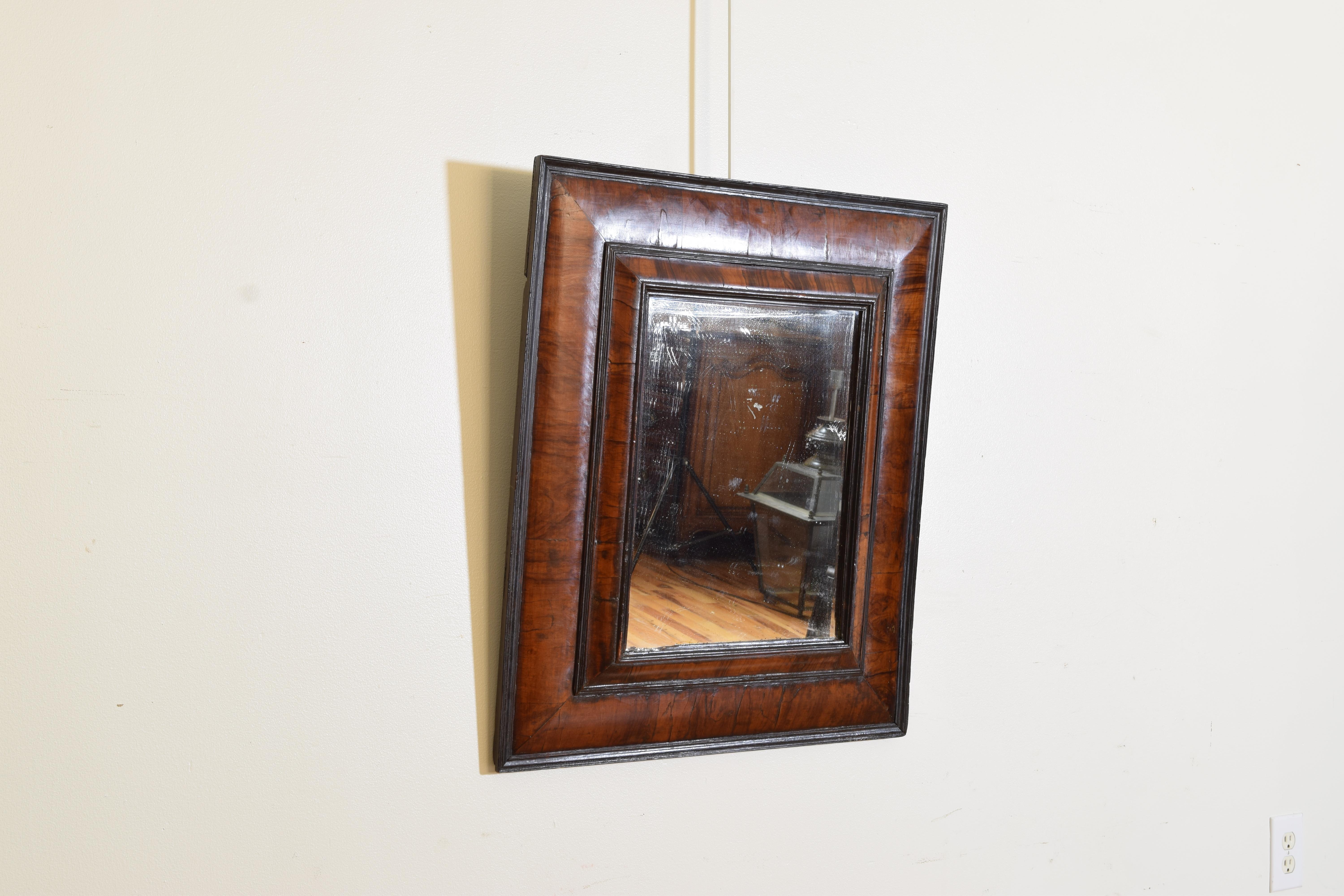 Dutch Late Baroque Walnut & Ebonized Cushion Form-Mirror, late 17th century In Good Condition For Sale In Atlanta, GA