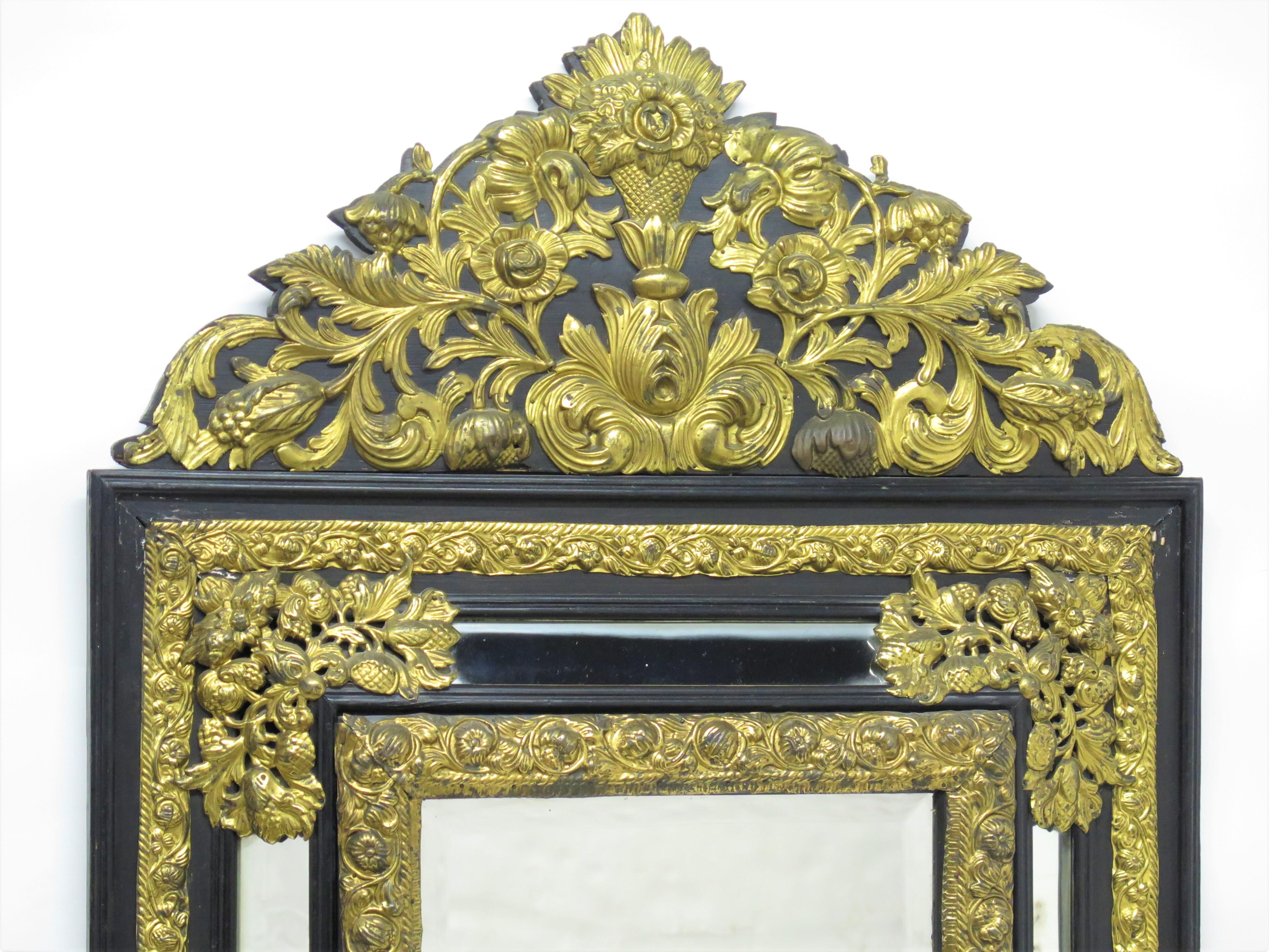 Gilt Dutch Looking Glass of Ebony and Brass Repoussé For Sale