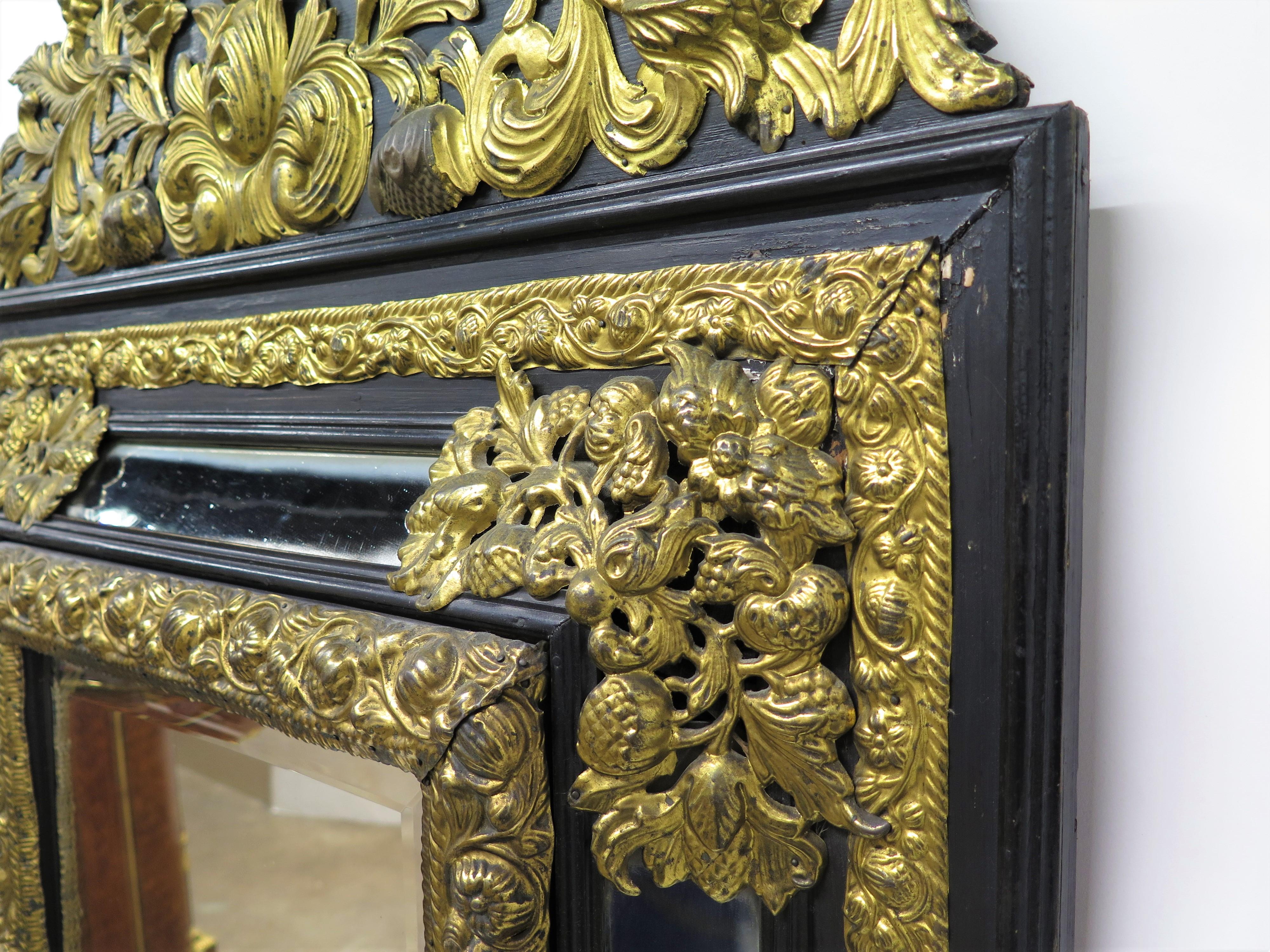 Dutch Looking Glass of Ebony and Brass Repoussé For Sale 1