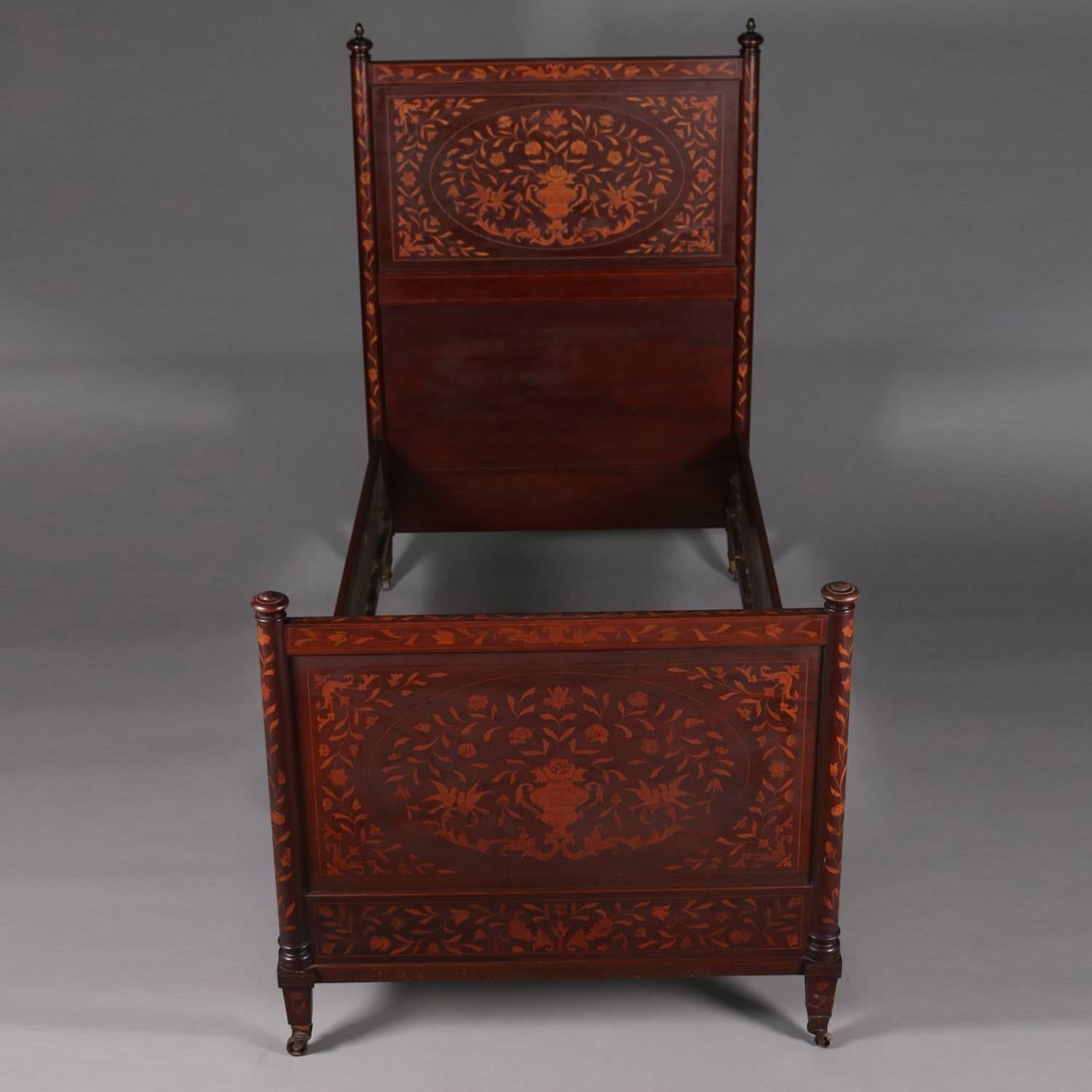 Dutch Marquetry twin bed frame by Geo. C. Flint & Co., NY features overall foliate, floral and urn satinwood inlay with banding, original label, seated on casters, circa 1870

Measures: 64.5