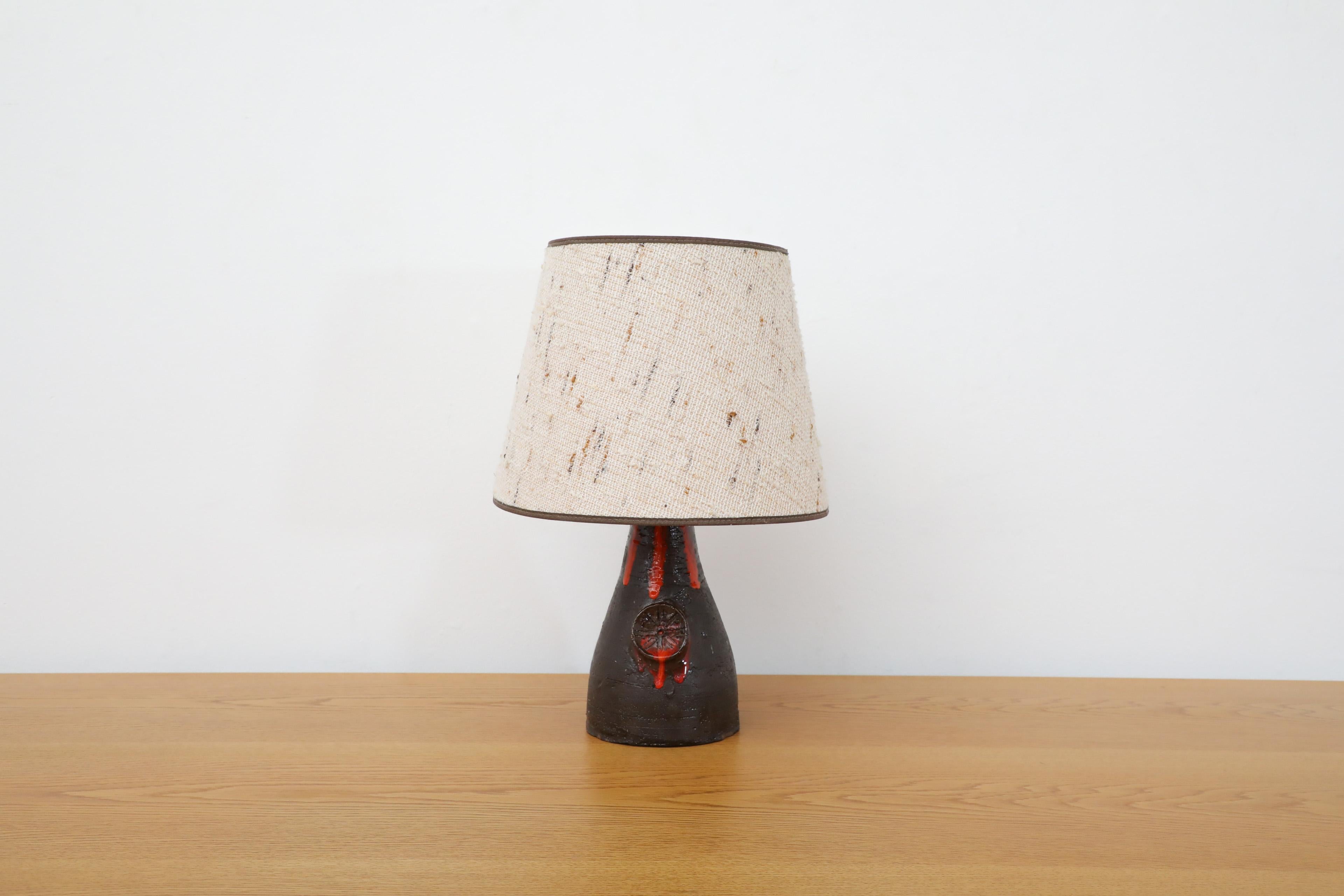 Mid-Century Modern Dutch Mid-Century Black Ceramic Volcanic Table Lamp w/ Red Dripping Effect Glaze For Sale