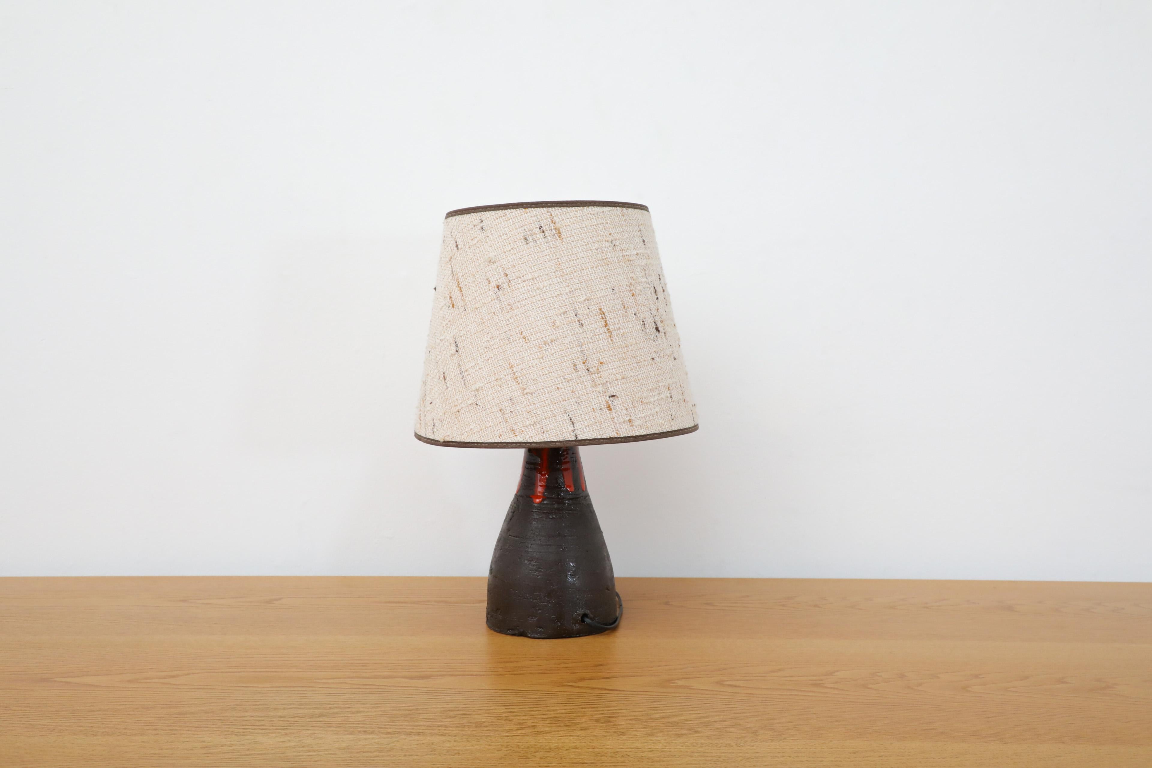 Metal Dutch Mid-Century Black Ceramic Volcanic Table Lamp w/ Red Dripping Effect Glaze For Sale