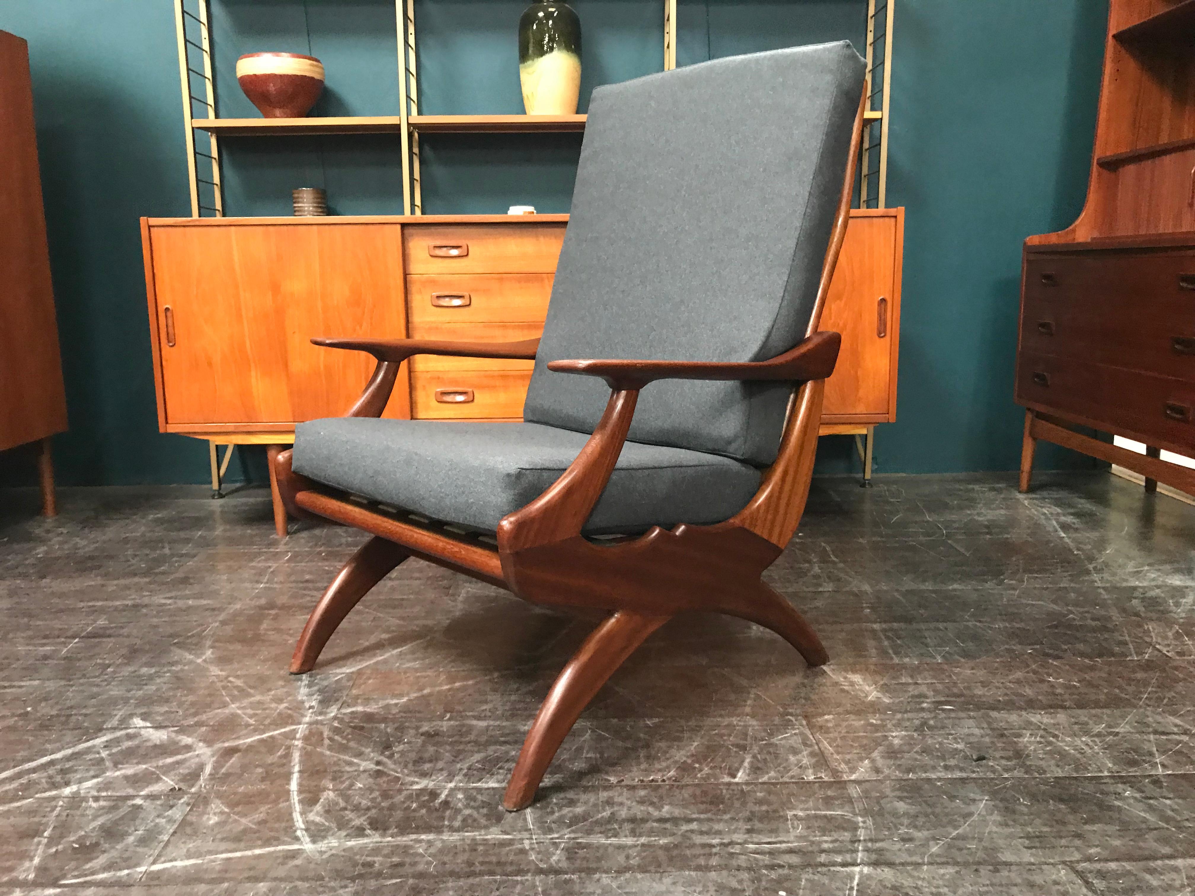 This gorgeous vintage midcentury chair was designed and made in The Netherlands in the 1960s and is one of the rarest chairs manufactured by De Ster (The Star).

The cushions and grey fabric are brand new as we’ve just had these renewed by a