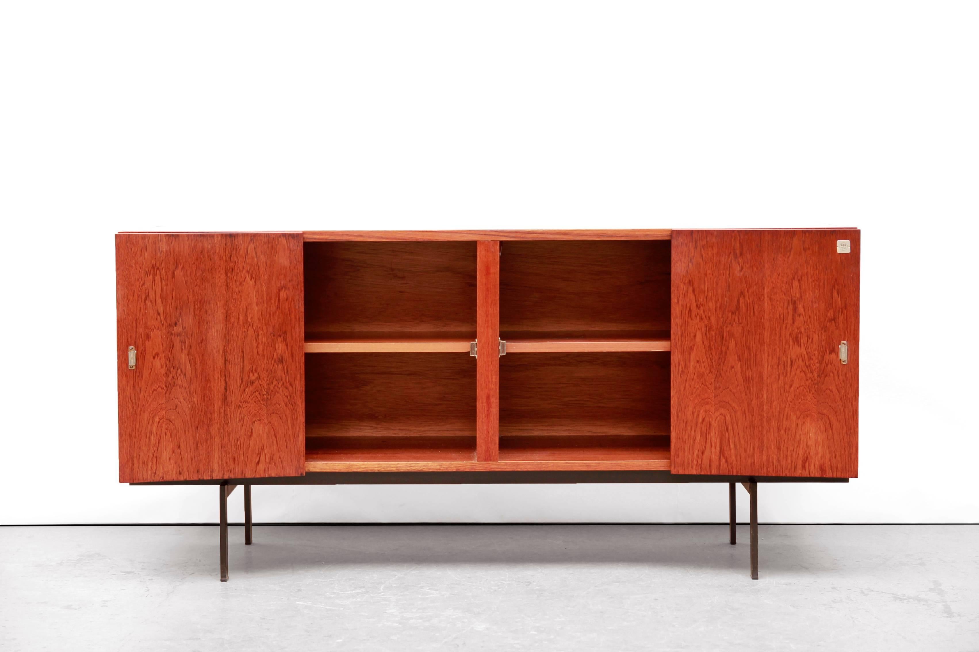 Beautiful Minimalist sideboard designed by Cees Braakman for Pastoe in The Netherlands in the early 1960s. This sideboard comes from the well-known series of Pastoe which has been renamed the 'Japanese Series' by its sleek shapes and simplicity. The