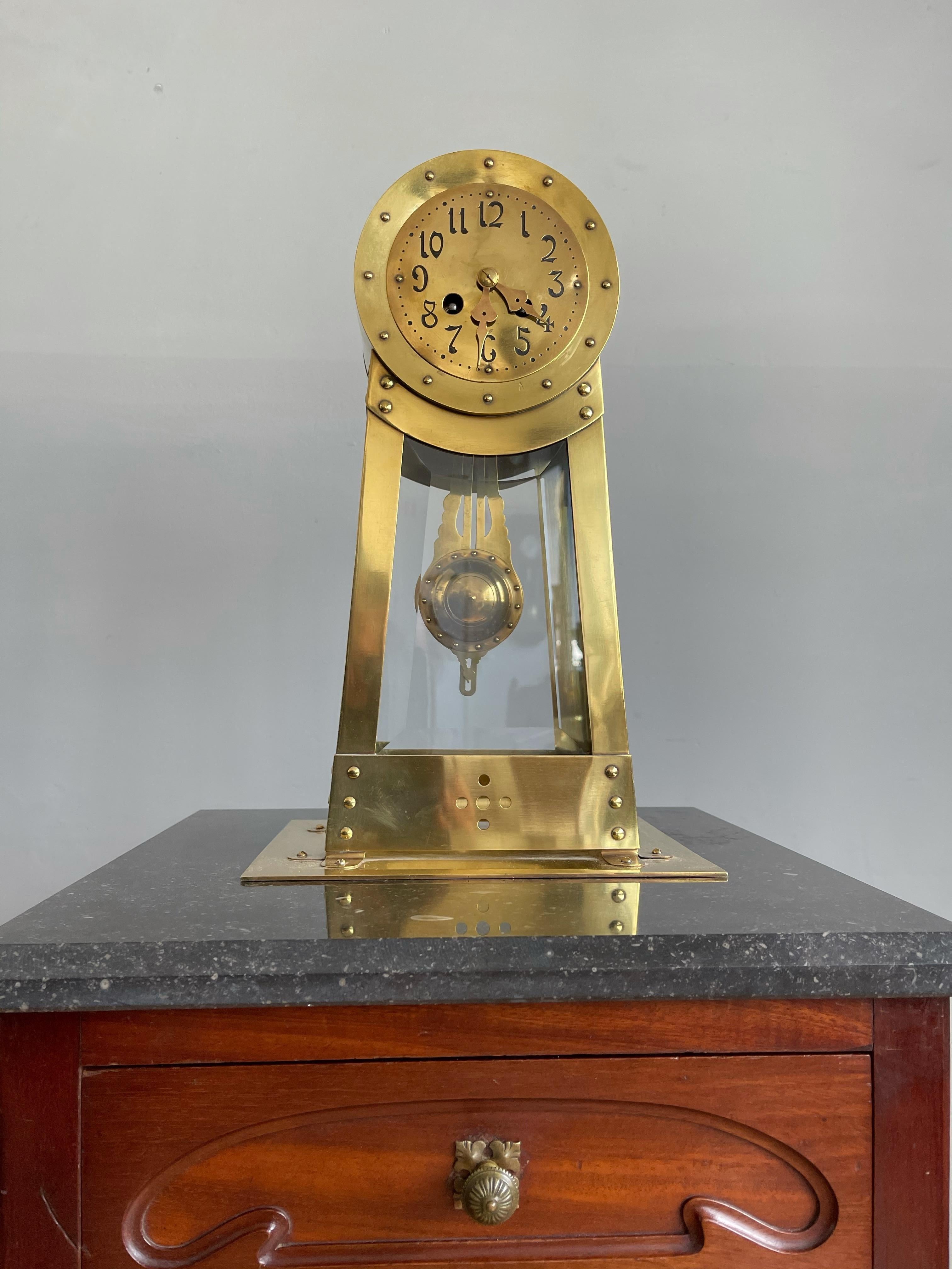 Unique design clock for the collectors of timeless antiques.

Finding this unique Arts & Crafts Dutch desk / table clock truly felt like a blessing. The overall design is remarkable, but the combination of the craftsmanship of the hammered brass and