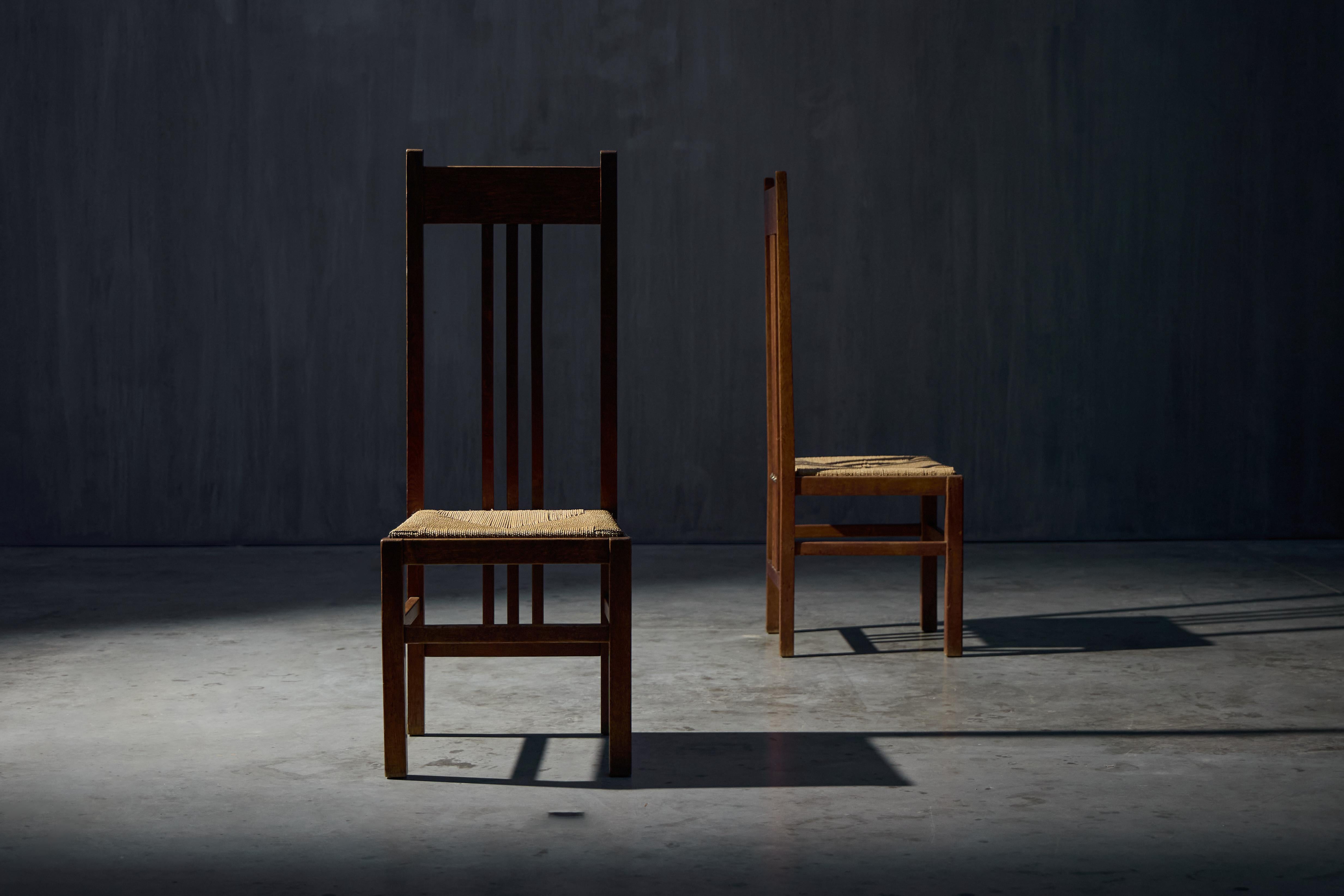 Early 20th-century chairs, hailing from the distinguished Hague School in the Netherlands, dating back to the 1920s. With a pure and simple beauty, these chairs epitomize the essence of modern antique design, offering a glimpse into the past while