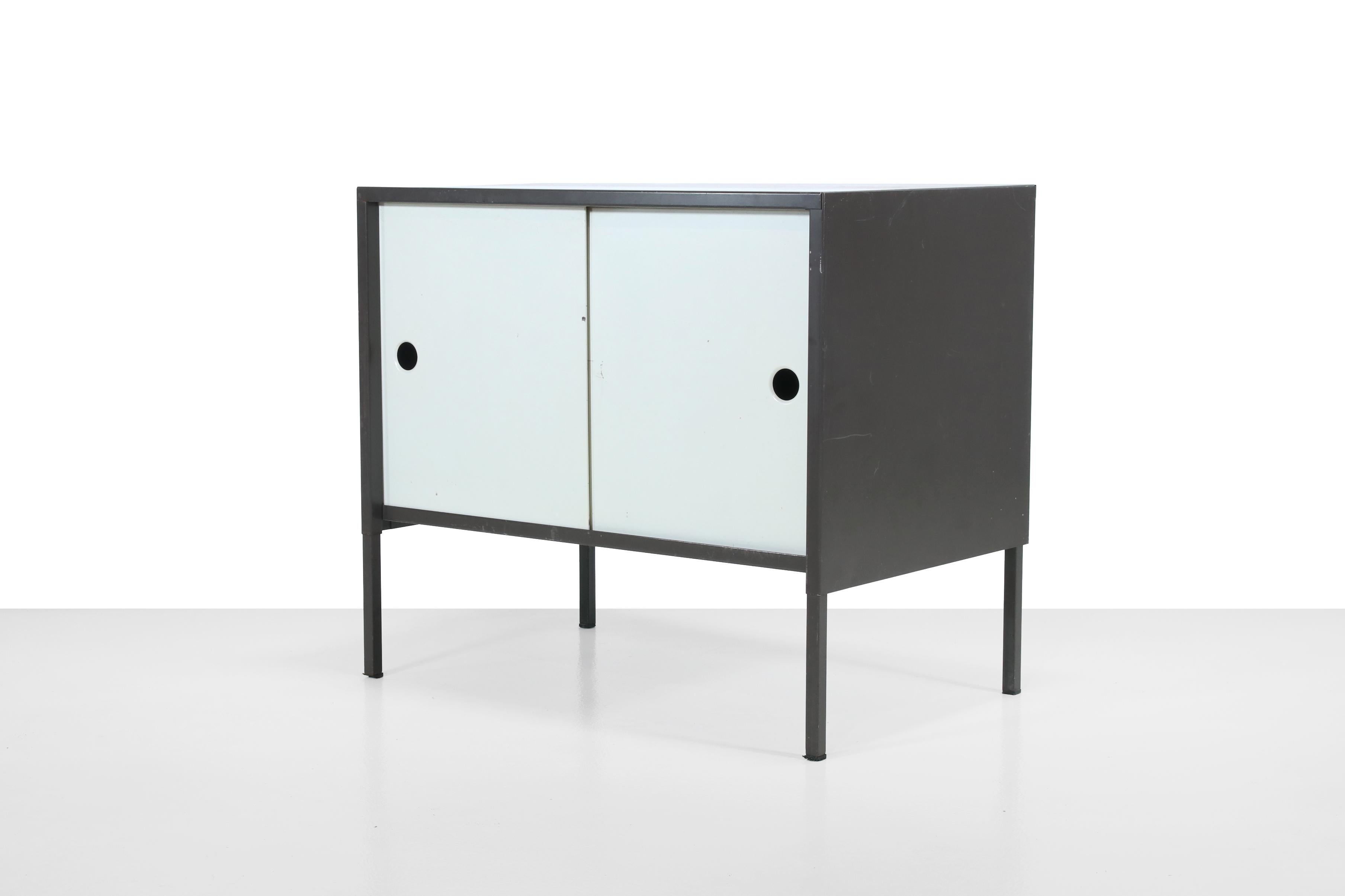 Rare cabinet by Coen de Vries for Pilastro. Made of gray and white lacquered metal. Super nice minimalist Dutch design cabinet for in the hallway, for your record player or wherever you want. Due to its size, the cabinet is super versatile. The