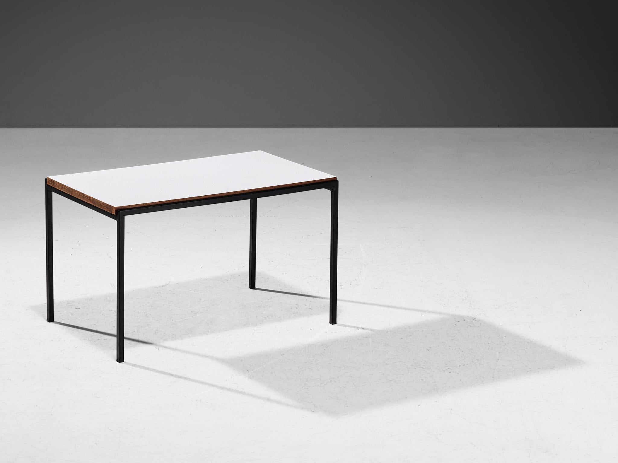 Coffee table, Dutch, metal en wood, 1960s.

A simplistic Dutch side or coffee table consisting of a black metal frame with a white lacquered wooden top. The wooden top is partially levitating in the metal frame, which makes it interesting and