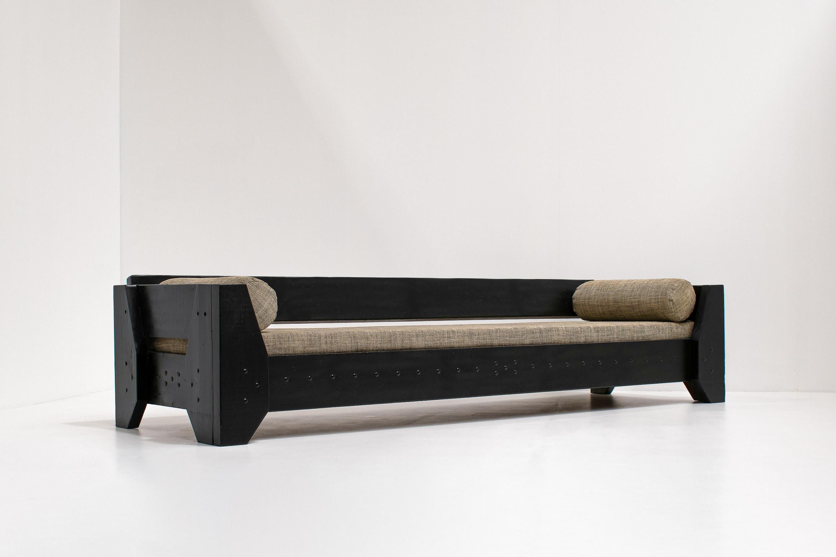 Sophisticated daybed with brutalist details and a solid wooden frame, 1960s, Mid-century, Modernism.
Sourced in the Netherlands and reminiscent of design of Dom Hans Van Der Laan or designs of the Bossche school. It is an exceptional piece due to