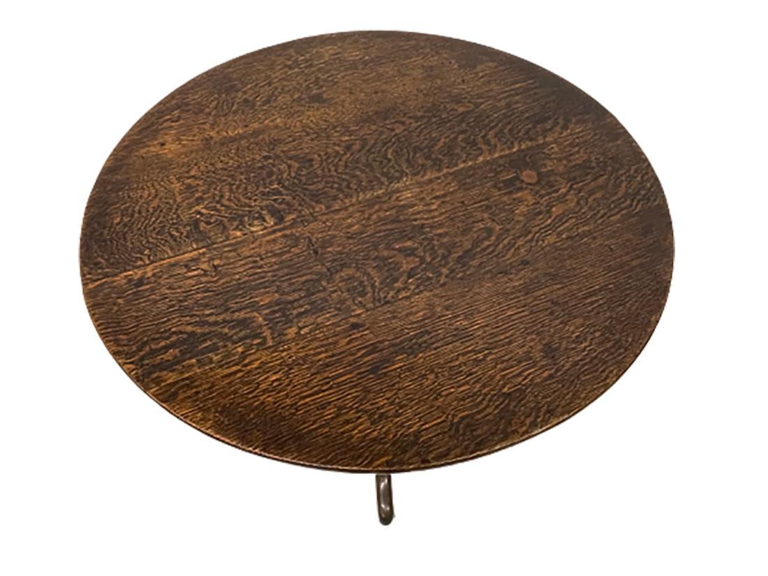 Dutch oak 19th century tilt-top tripod table

A round with beautiful patina oak wooden tripod tilt-top table.
The wood has a natural oak groove, beautifully lived wood. Due to the light in the photo, it is possible to see
An early 19th Century