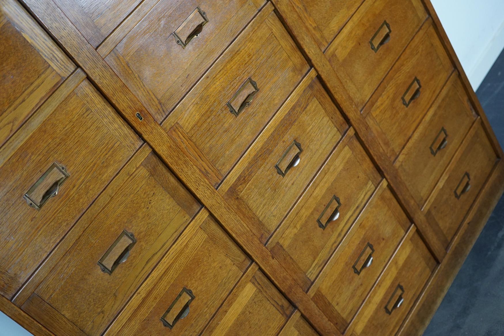 European Dutch Oak Apothecary / Filing Cabinet Folding Doors, 1930s For Sale
