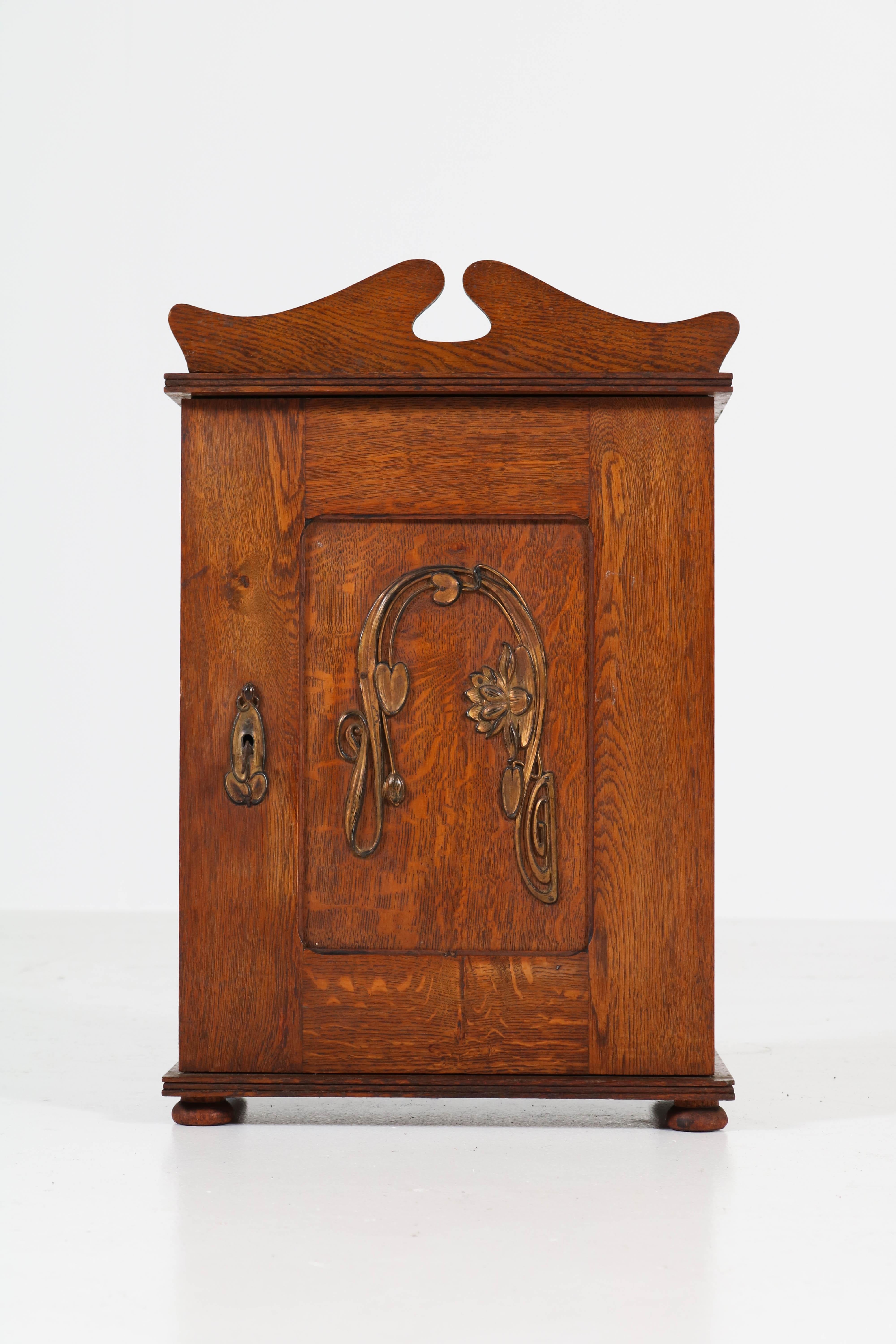 Early 20th Century Dutch Oak Art Nouveau Arts & Crafts Wall Cabinet with Brass Decor, 1900s