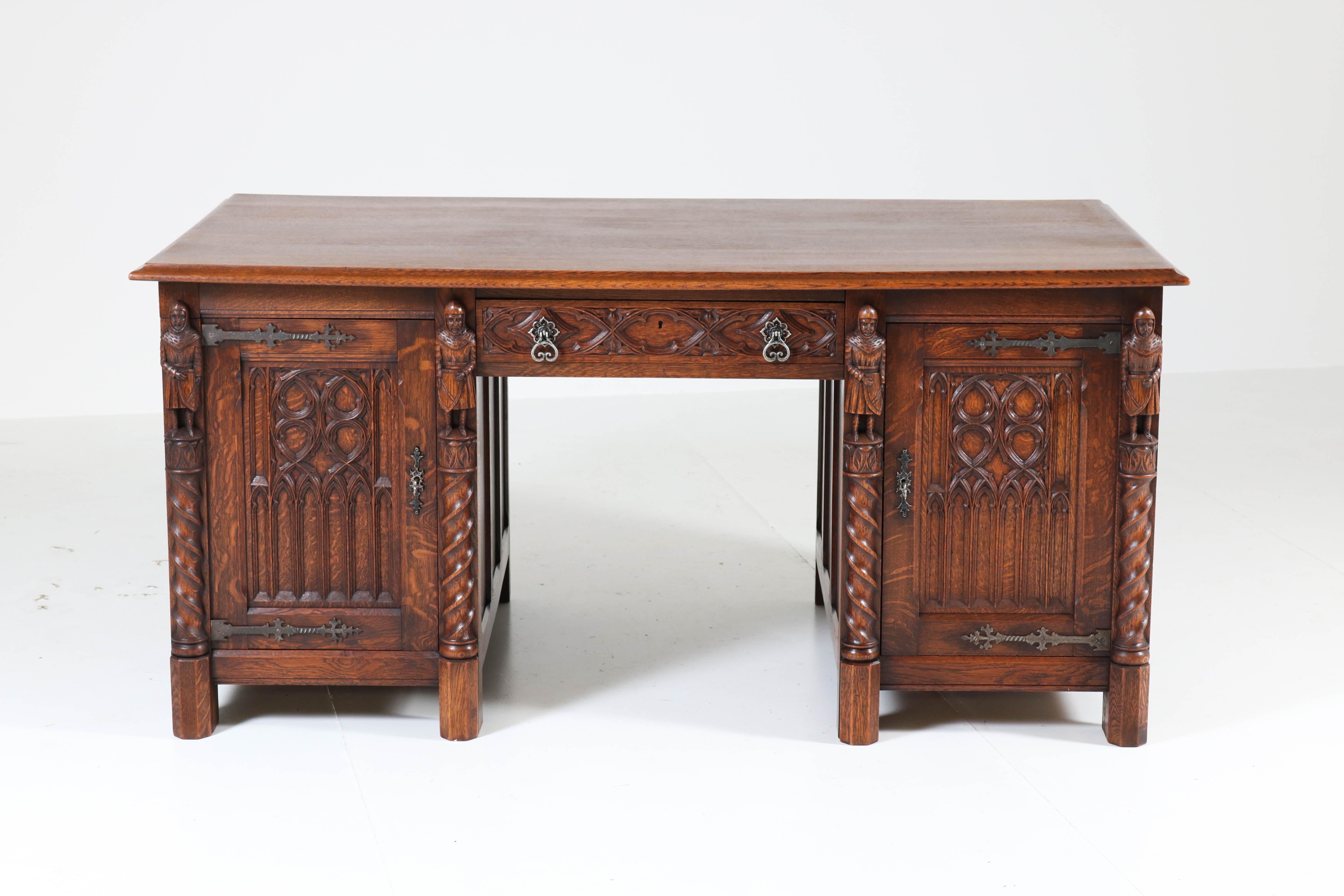 Dutch Oak Gothic Revival Pedestal Desk with Four Knights, 1940s In Good Condition In Amsterdam, NL