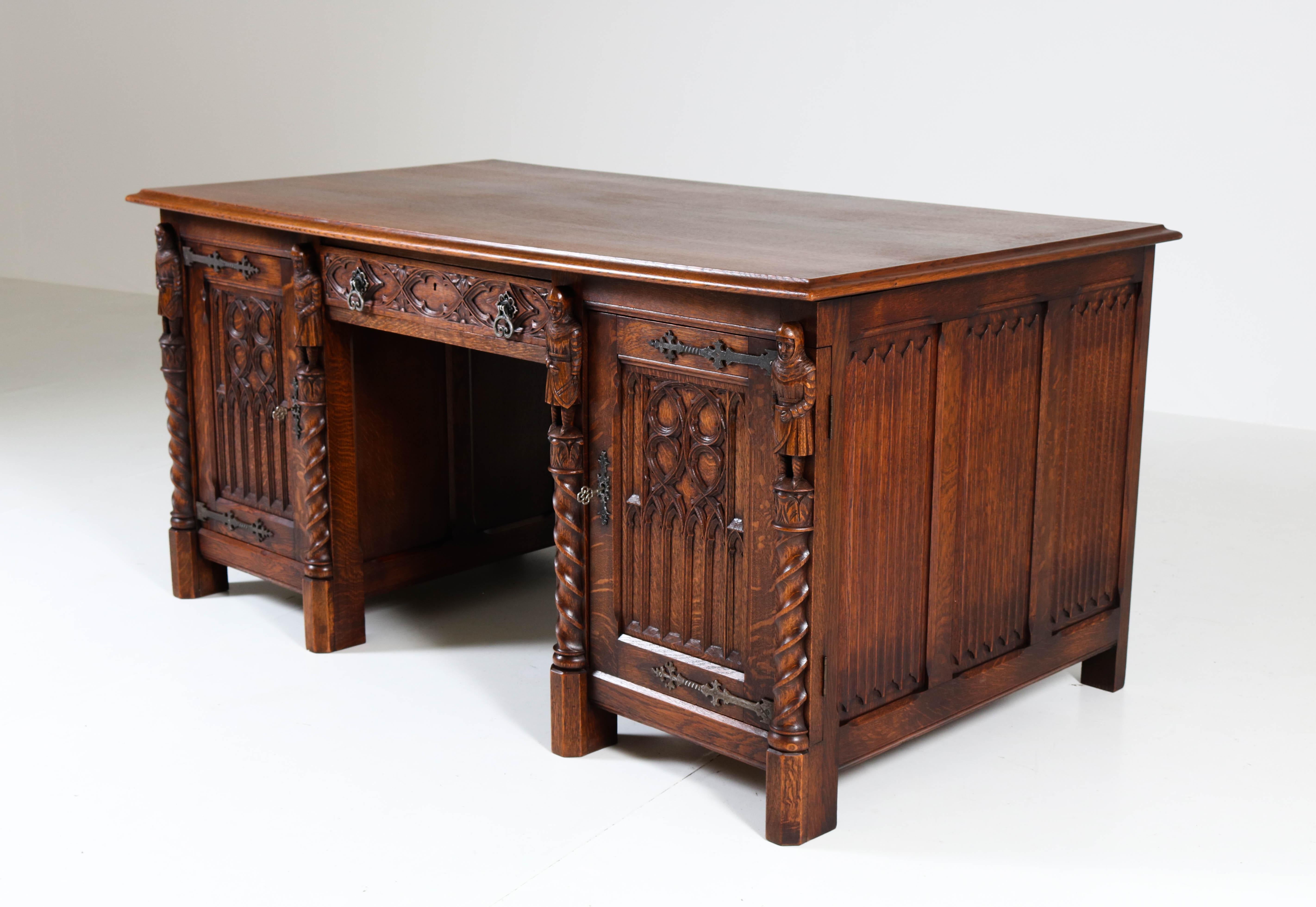 Mid-20th Century Dutch Oak Gothic Revival Pedestal Desk with Four Knights, 1940s