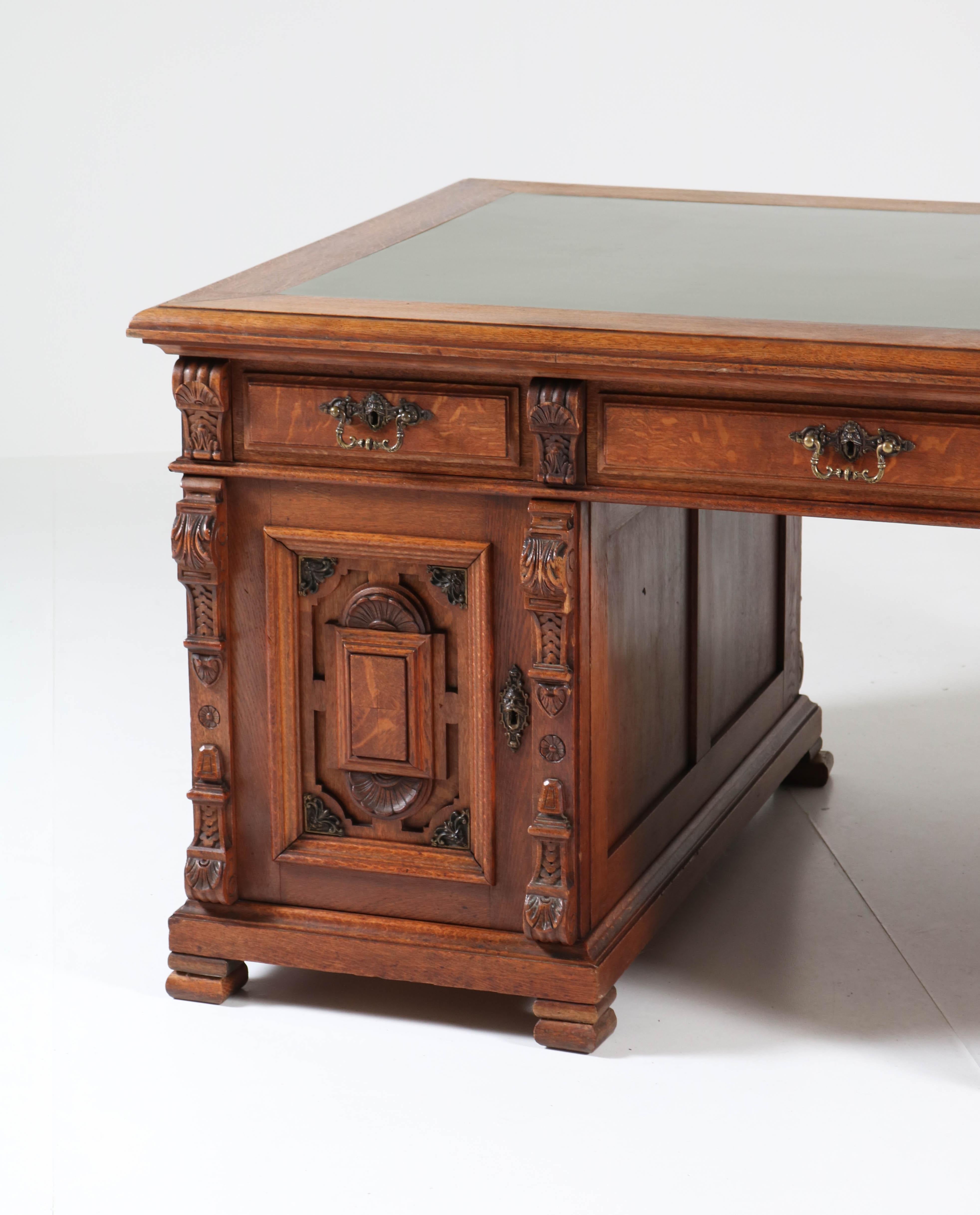 Late 19th Century Dutch Oak Renaissance Revival Pedestal Partner Desk, 1890s