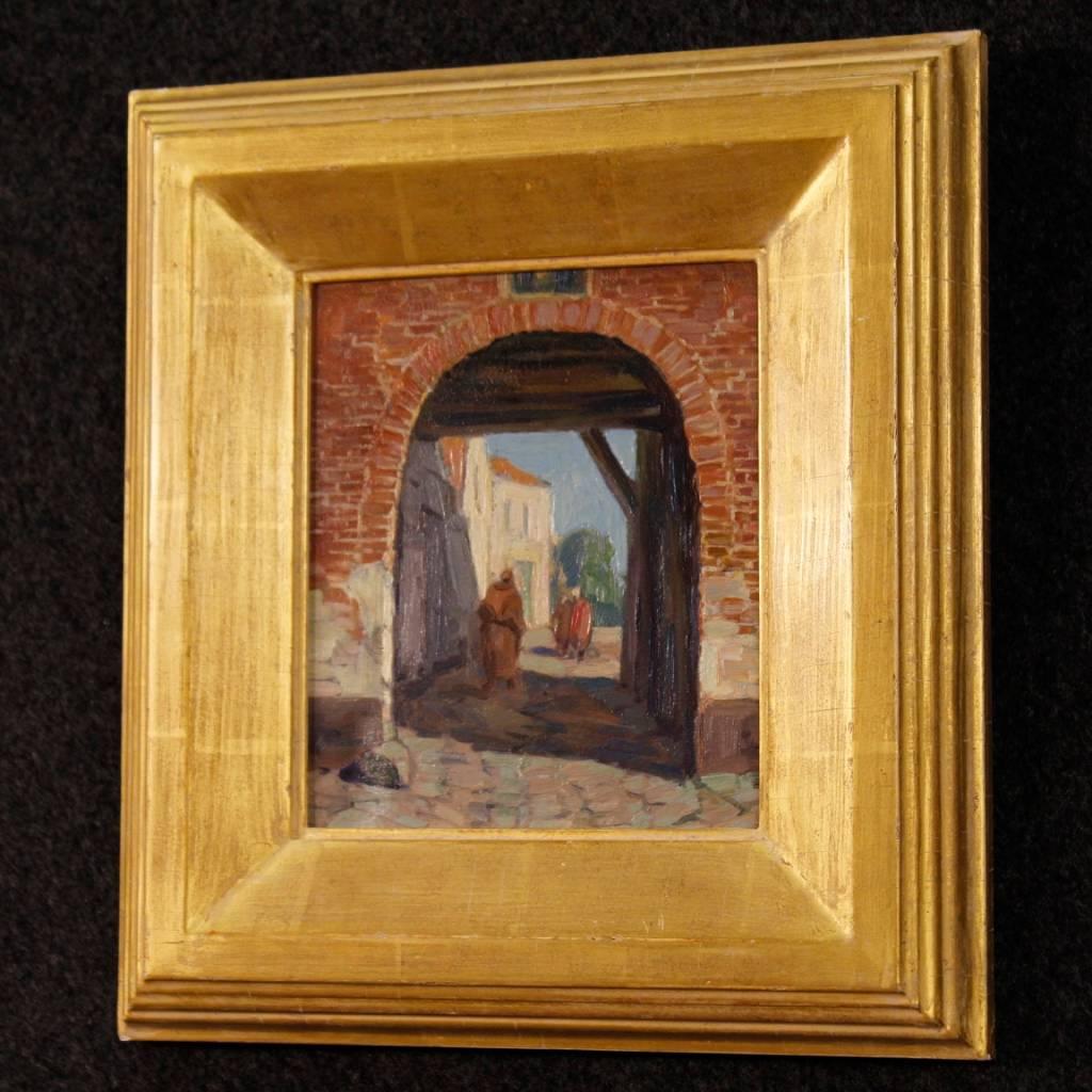 Dutch painting oil on board from 20th century. Painting depicting an antique village with characters. Contemporary wooden frame carved and gilded with some drops of color, overall in good state of conservation. Sight size: H 18.5 x W 15.5 cm.