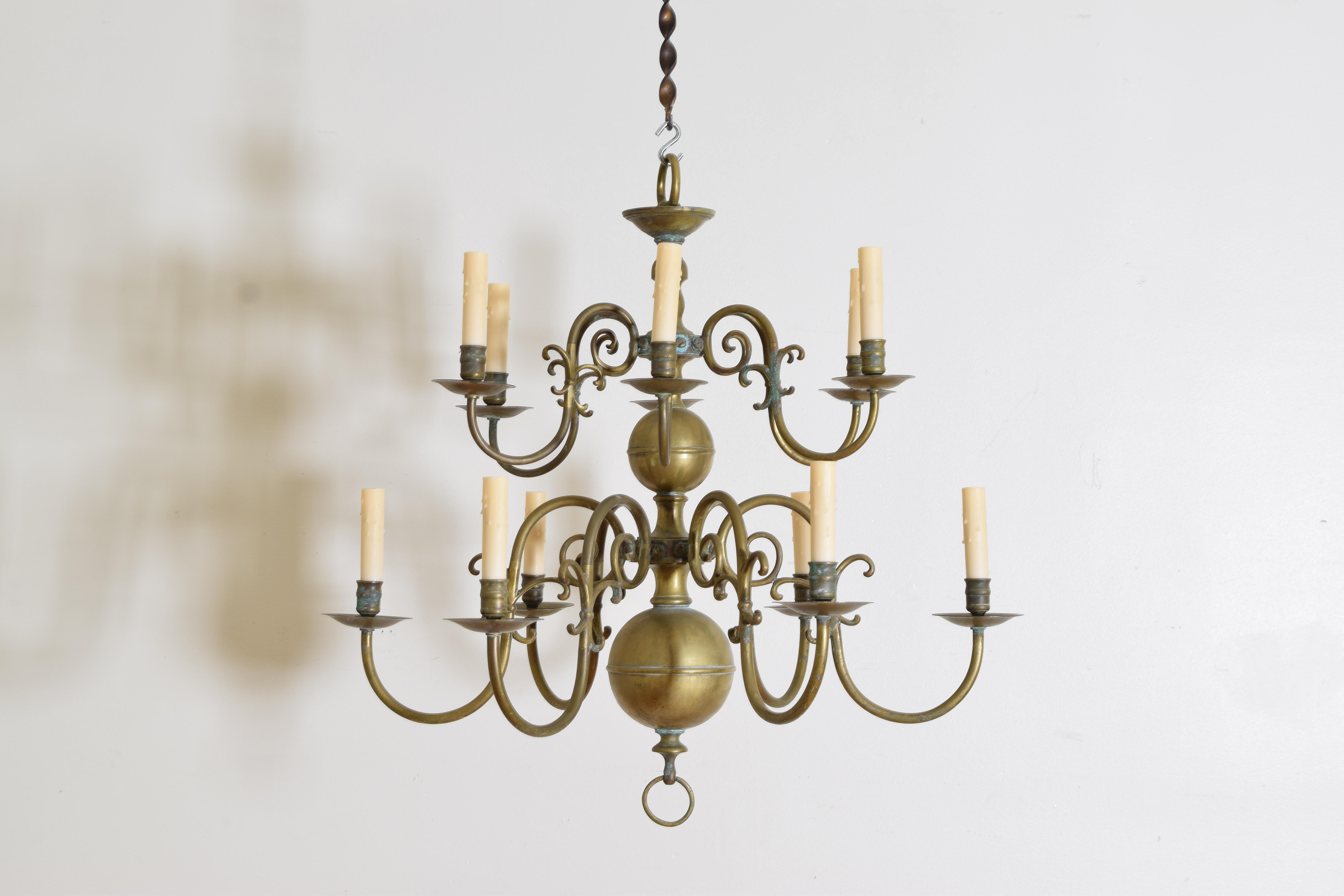 Having two tiers connected by spheres, original patina