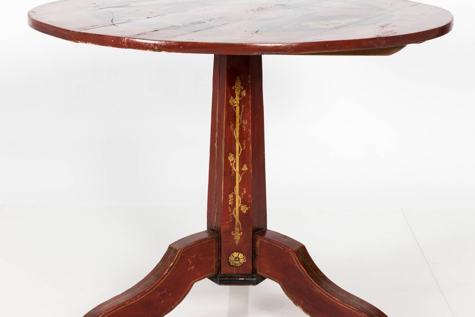 Dutch painted tilt top table with a circular top and a tripod base, circa early 20th century.
 