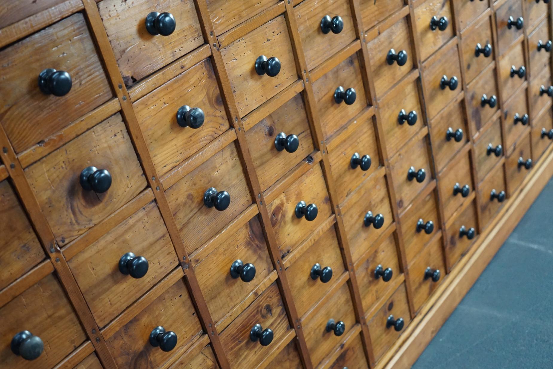 Dutch Pine Apothecary Cabinet or Bank of Drawers, 1940s 10