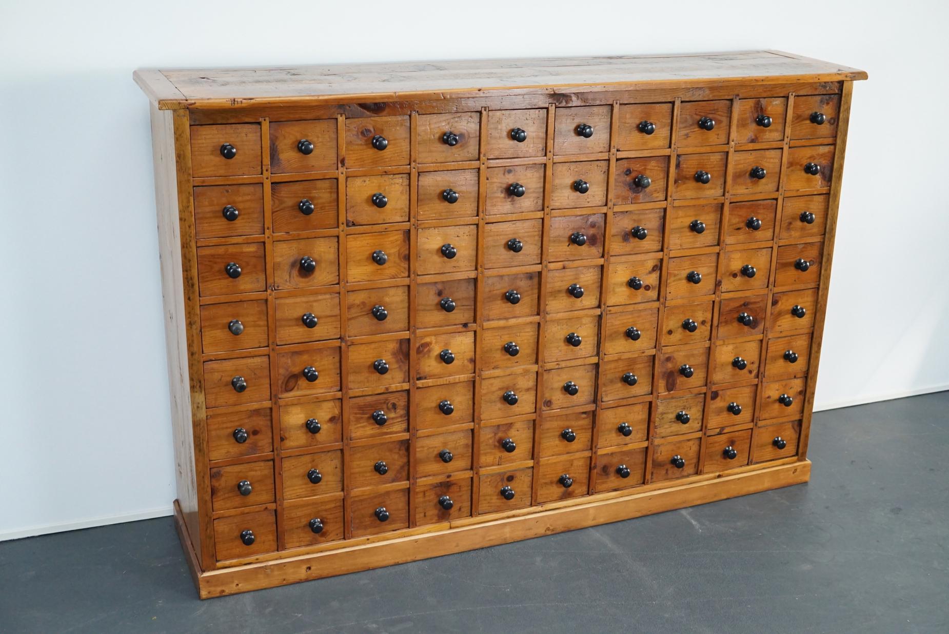 Industrial Dutch Pine Apothecary Cabinet or Bank of Drawers, 1940s