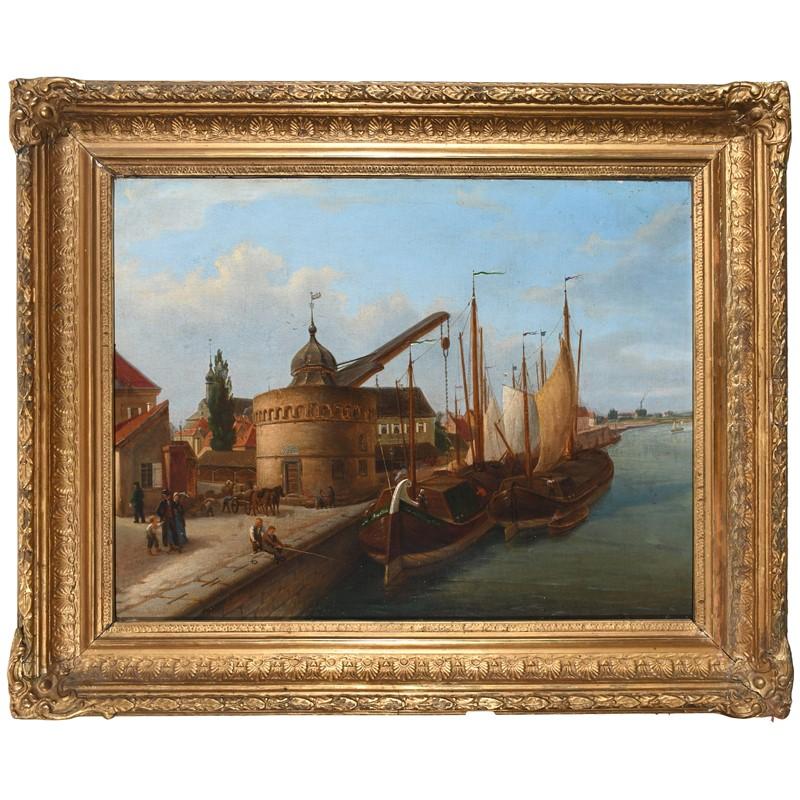 Dutch School 1869, Loading barges on a canal, with an elegant couple on the bank